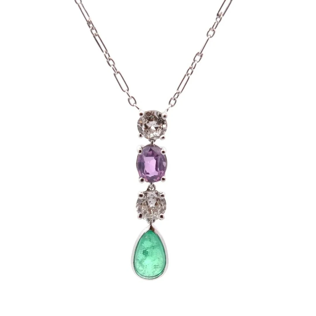 White gold pendant necklace with emerald, sapphire and diamonds