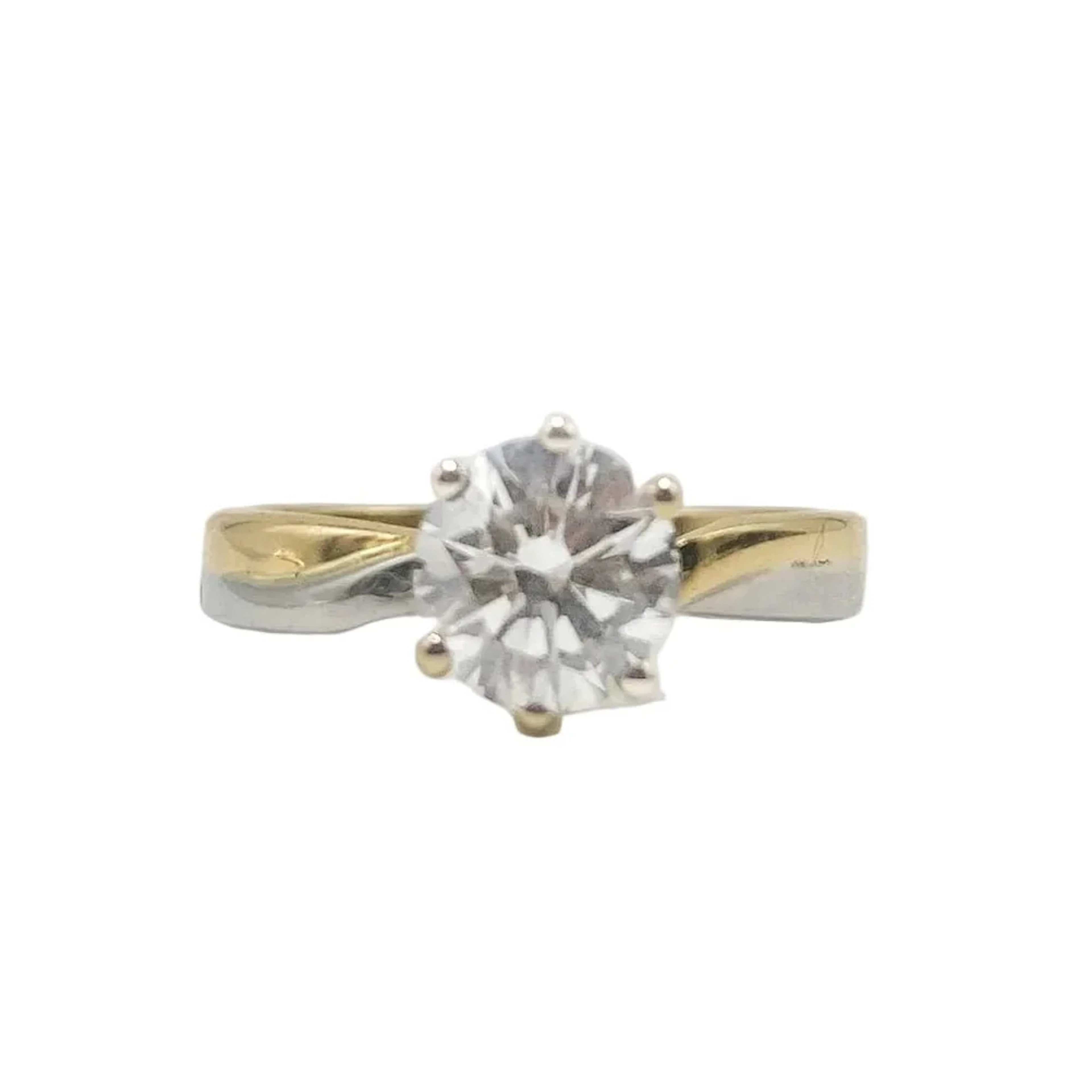 Solitaire Ring in White gold, Yellow gold, and Diamond