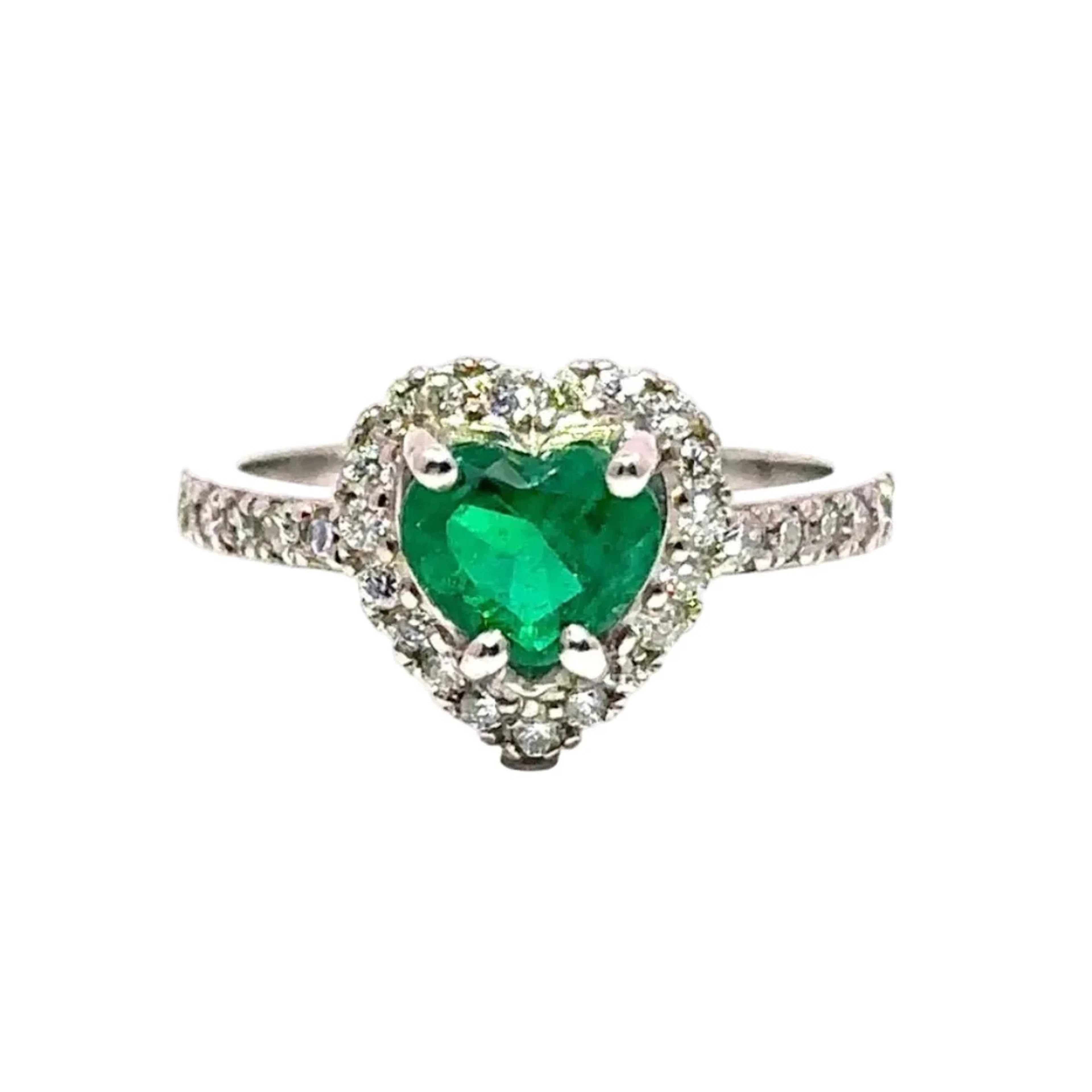 Bague Entourage en or blanc, émeraude et diamants