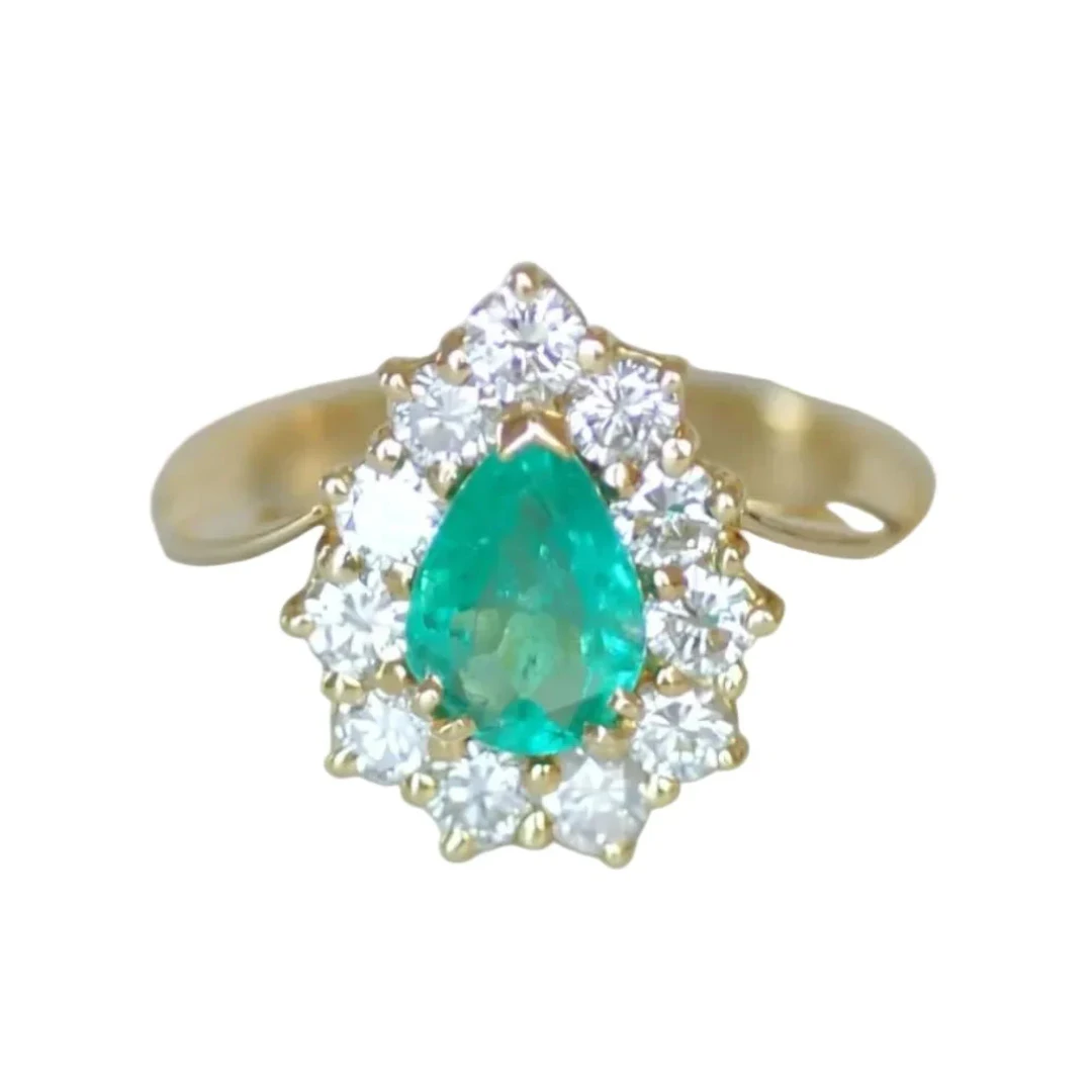 "Entourage" Ring in Yellow Gold, Emerald, and Diamonds