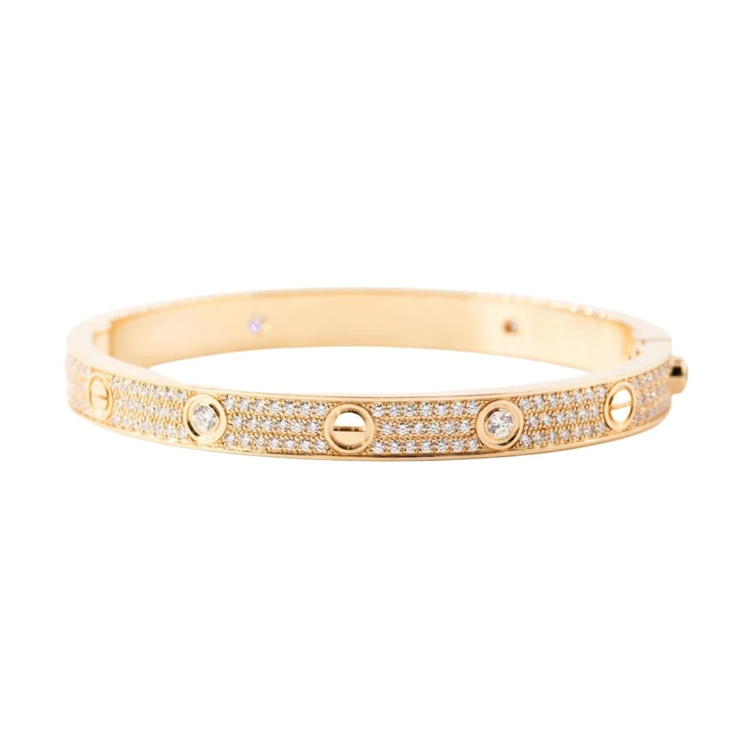 Bracelet CARTIER "Love" Modèle Classique Pavé en or rose et diamants