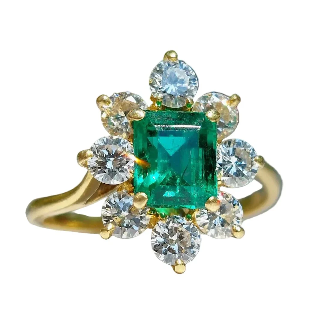 Ring Marguerite in yellow gold, emerald and diamonds