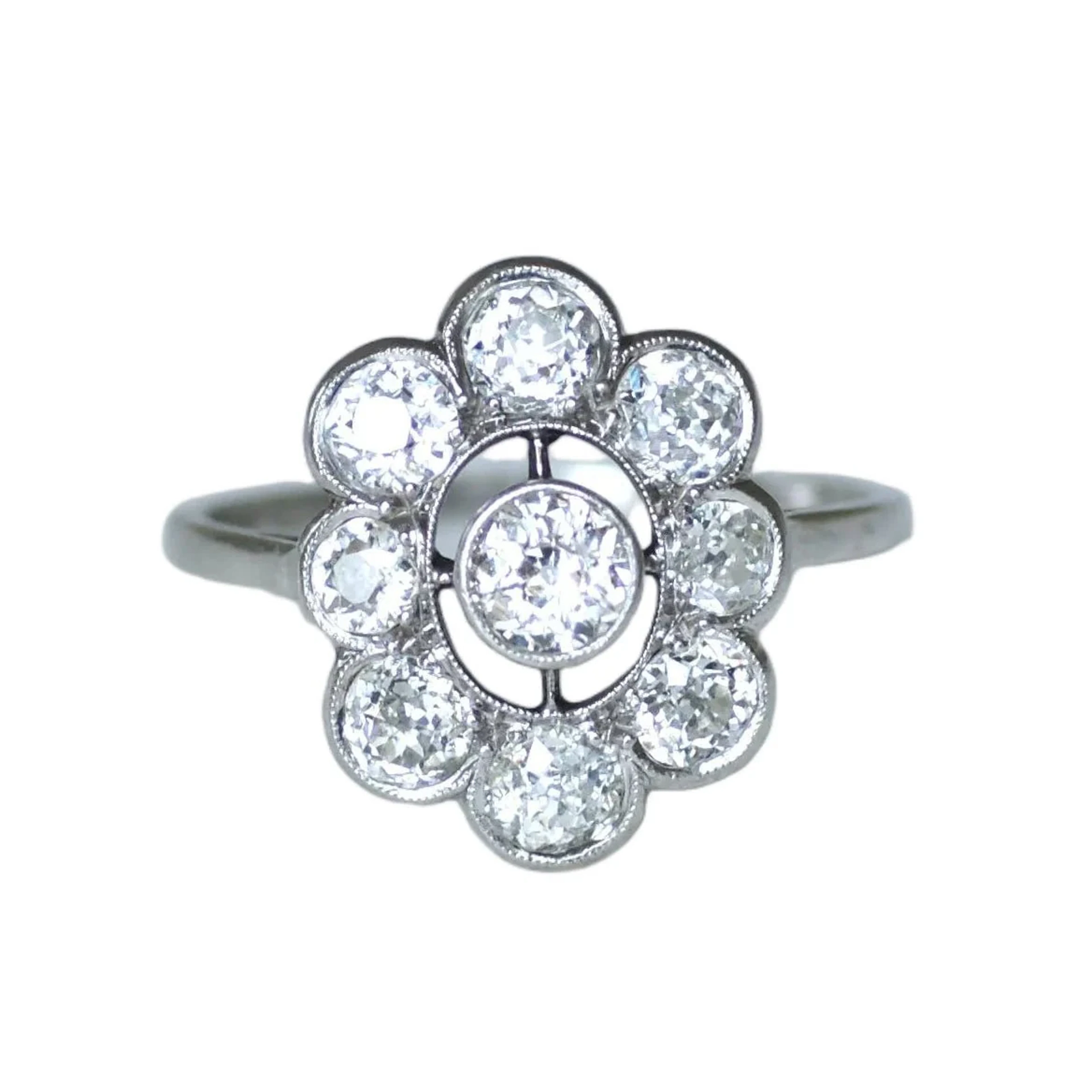 Daisy ring in white gold, platinum and diamonds