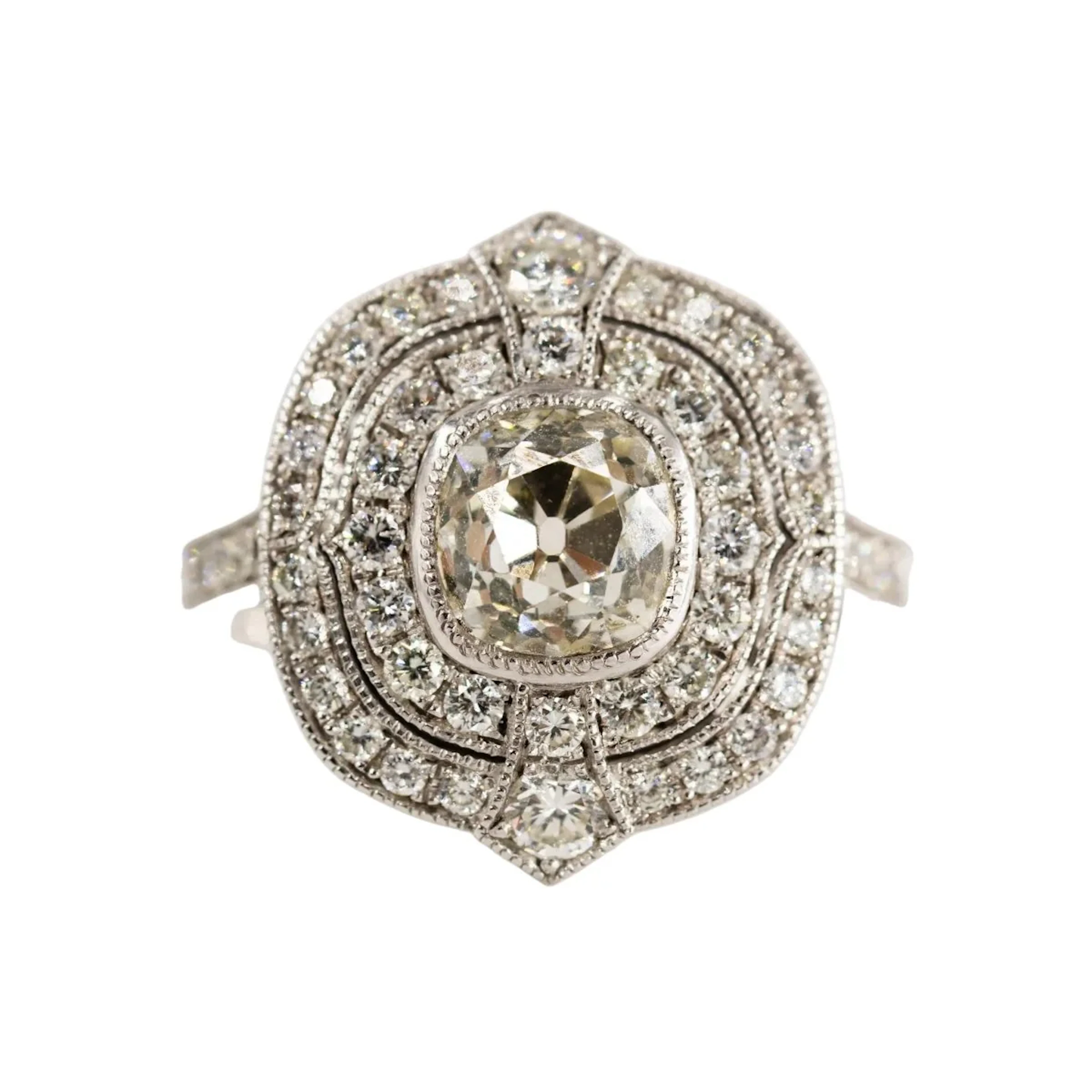 Entourage Ring in white gold, Platinum, and Diamonds