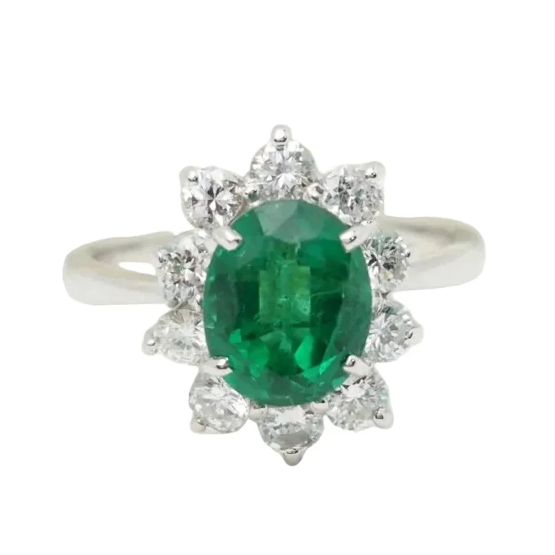 Ring surround in white gold, Zambian emerald and diamonds
