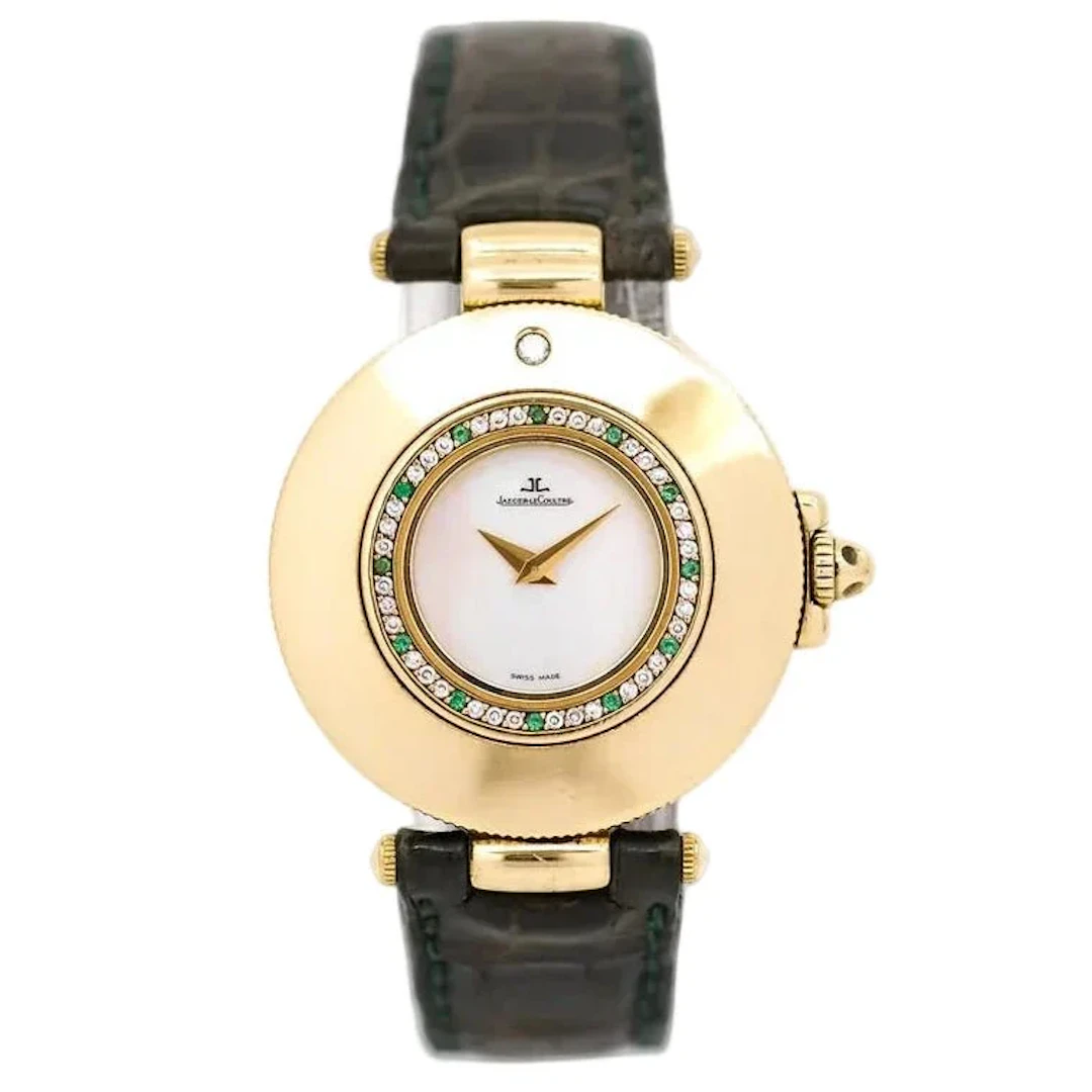 JAEGER-LECOULTRE watch in yellow gold, Mother-of-pearl, leather, emeralds