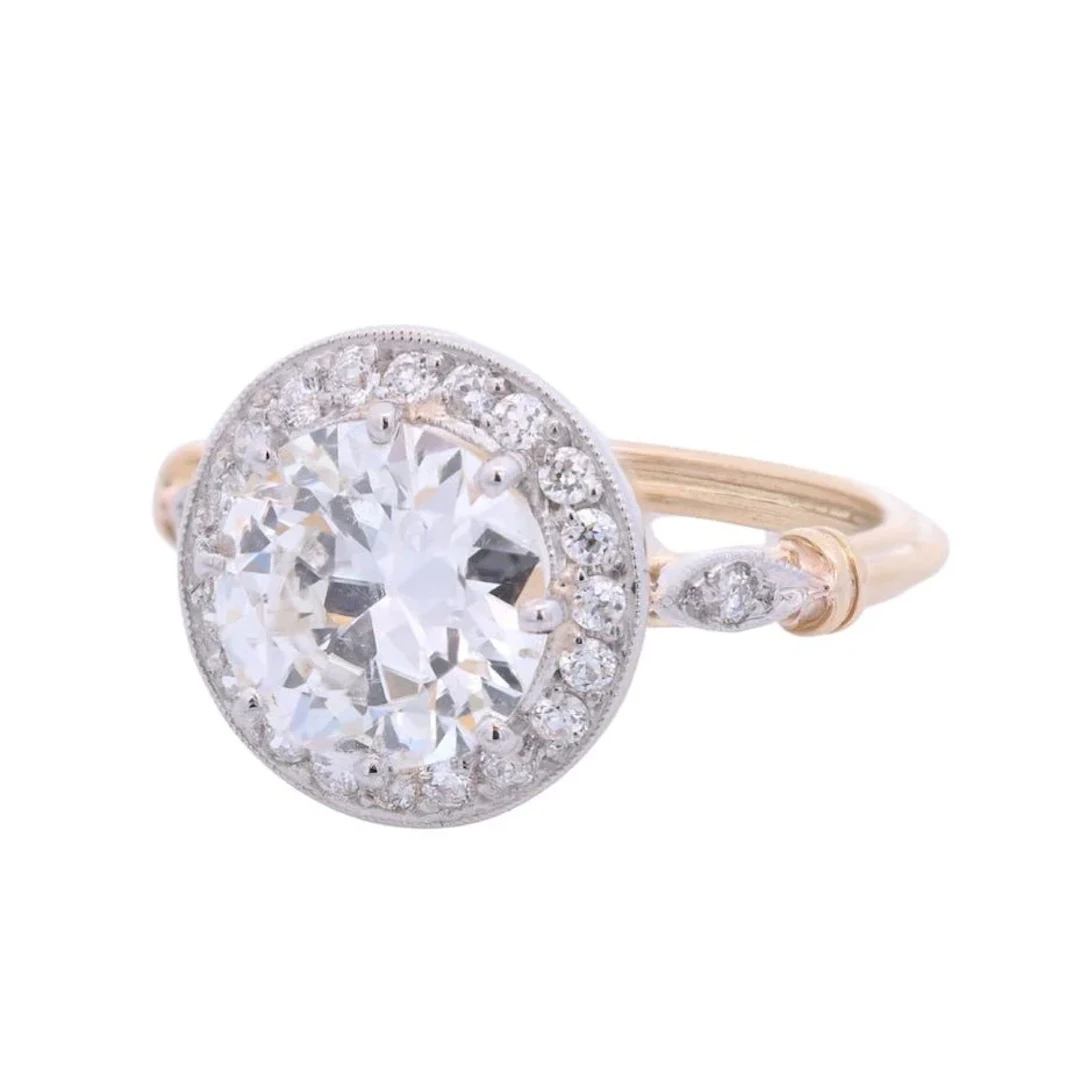 Entourage Ring in yellow gold, Platinum, and Diamonds