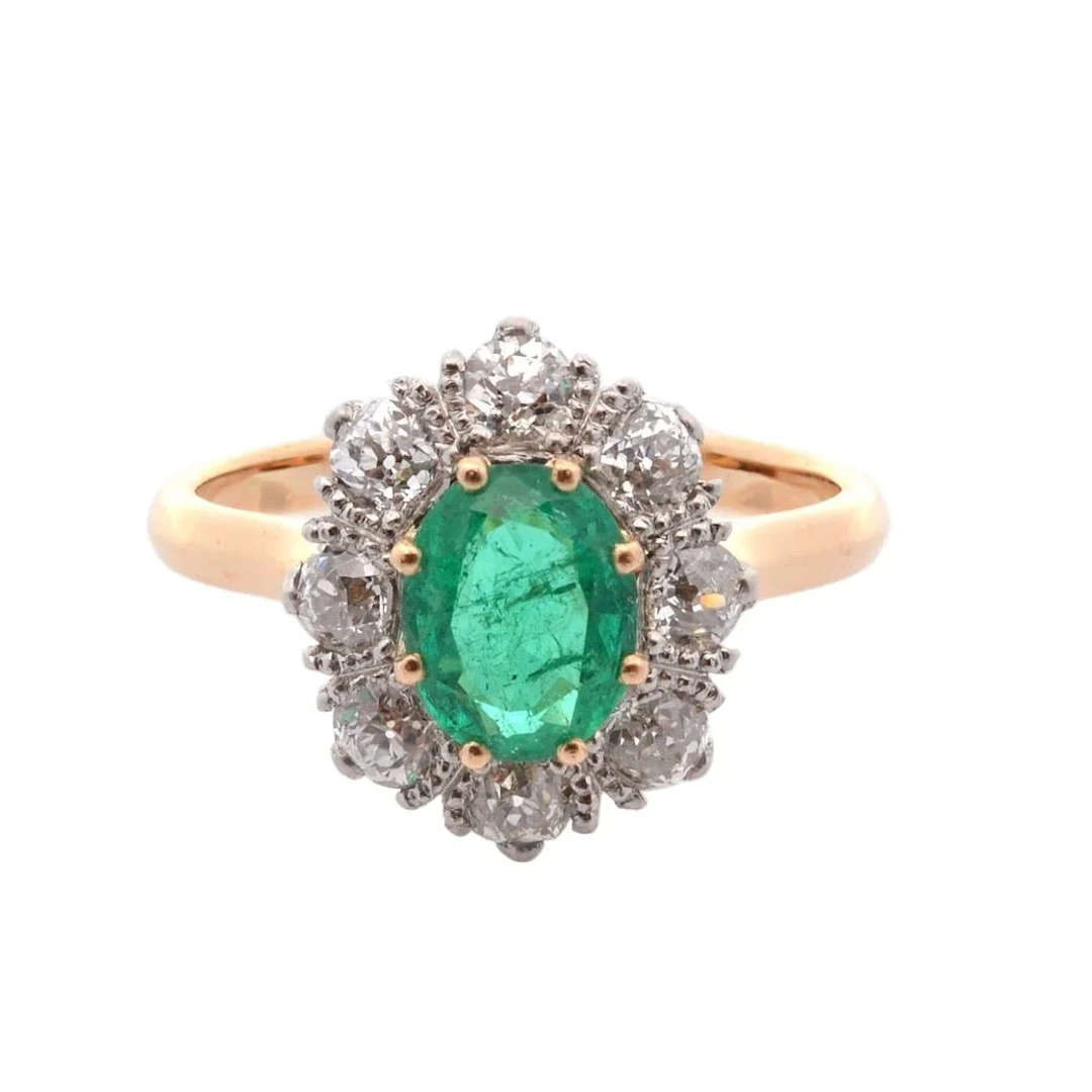 Daisy ring in yellow gold, platinum, emerald and diamonds