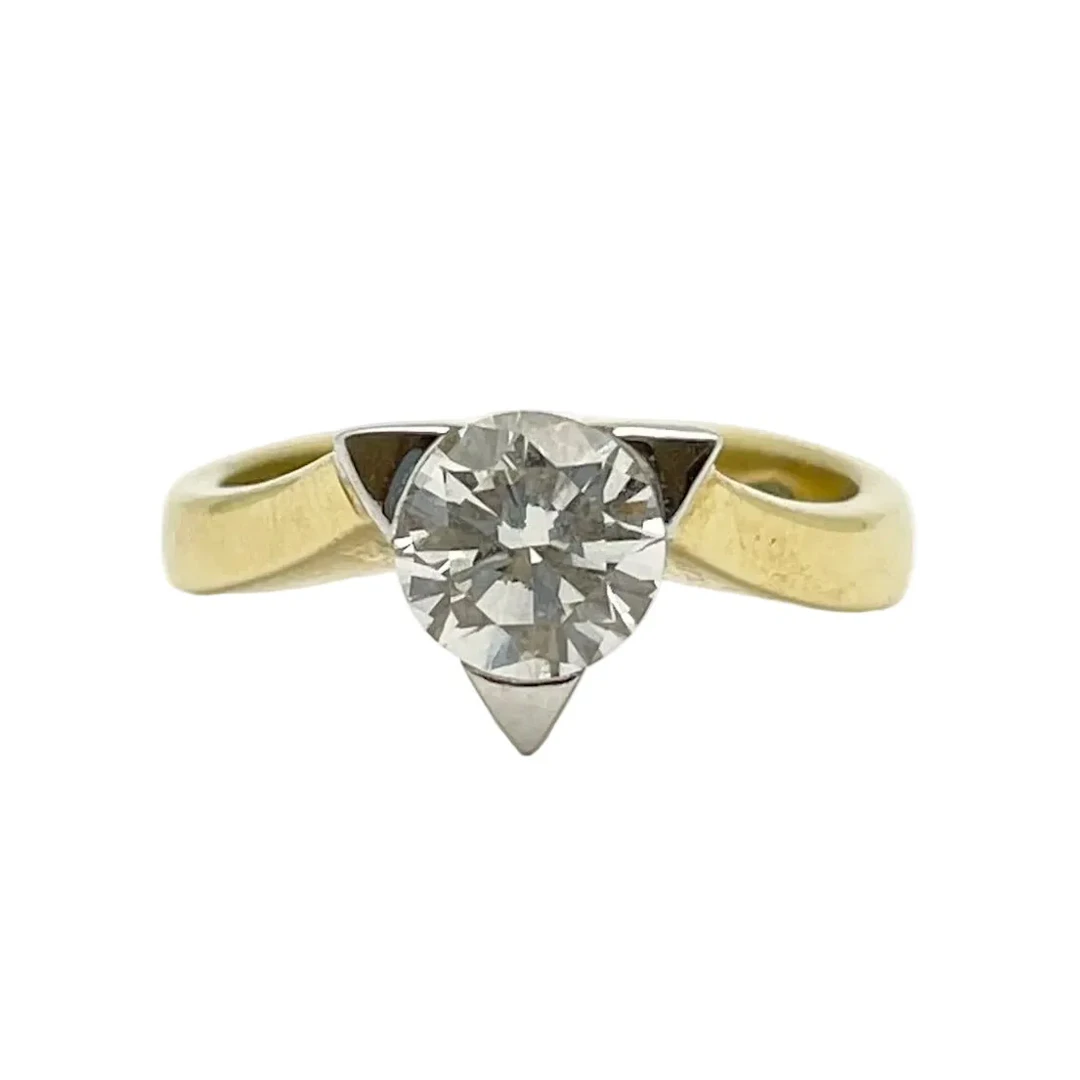 Solitaire Ring in White Gold, Yellow Gold, and Diamond