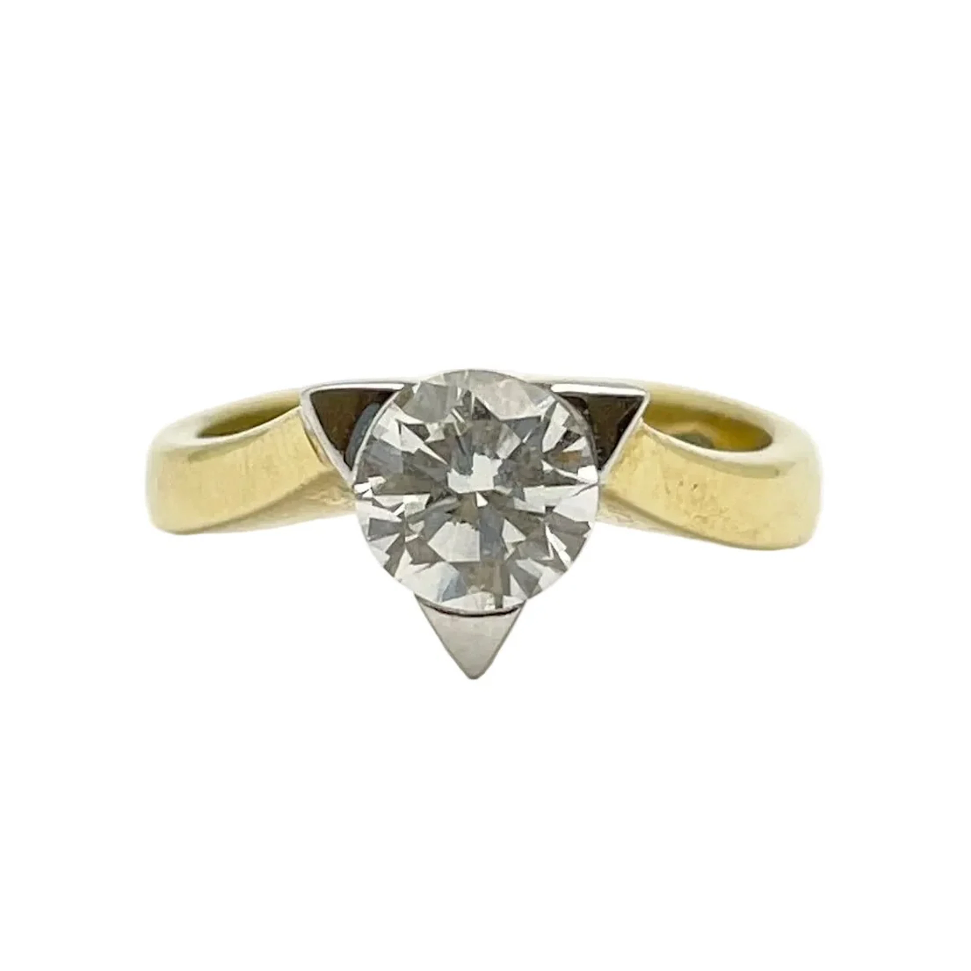 Solitaire Ring in White Gold, Yellow Gold, and Diamond