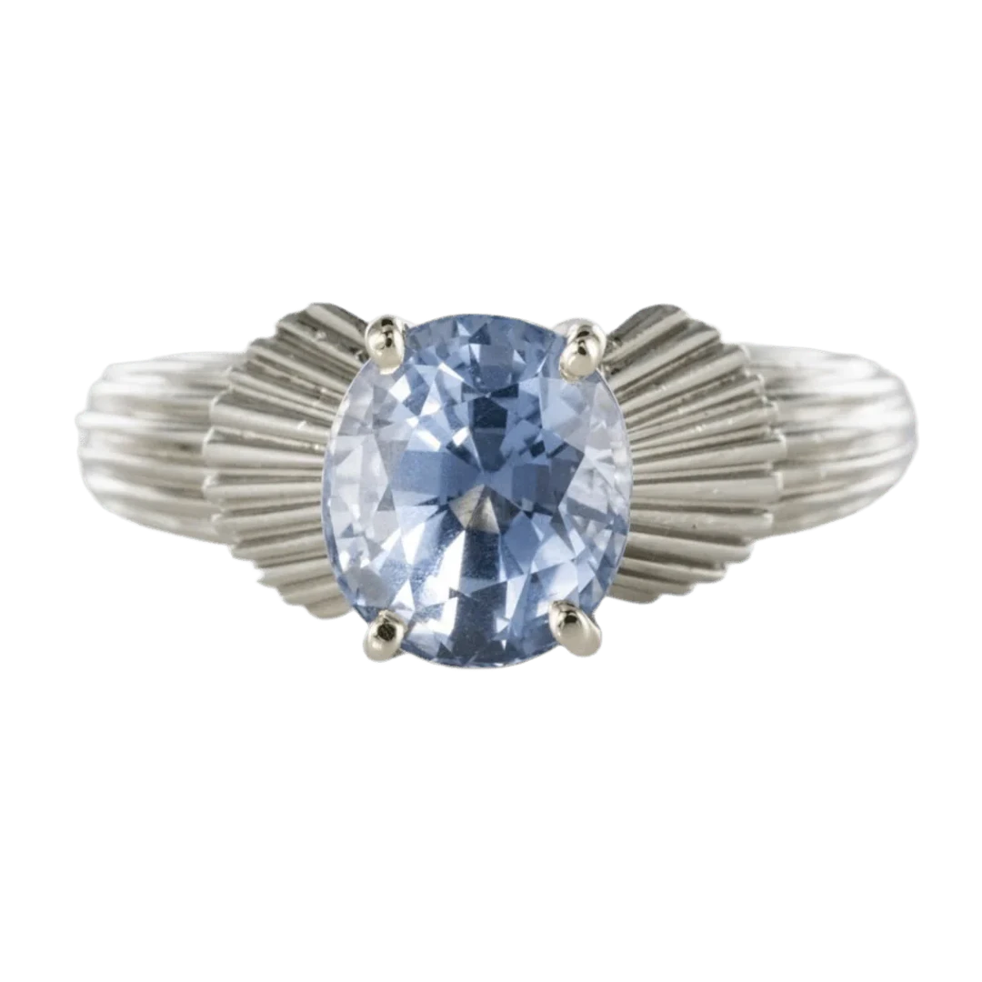Solitaire ring in white gold, platinum and sapphire