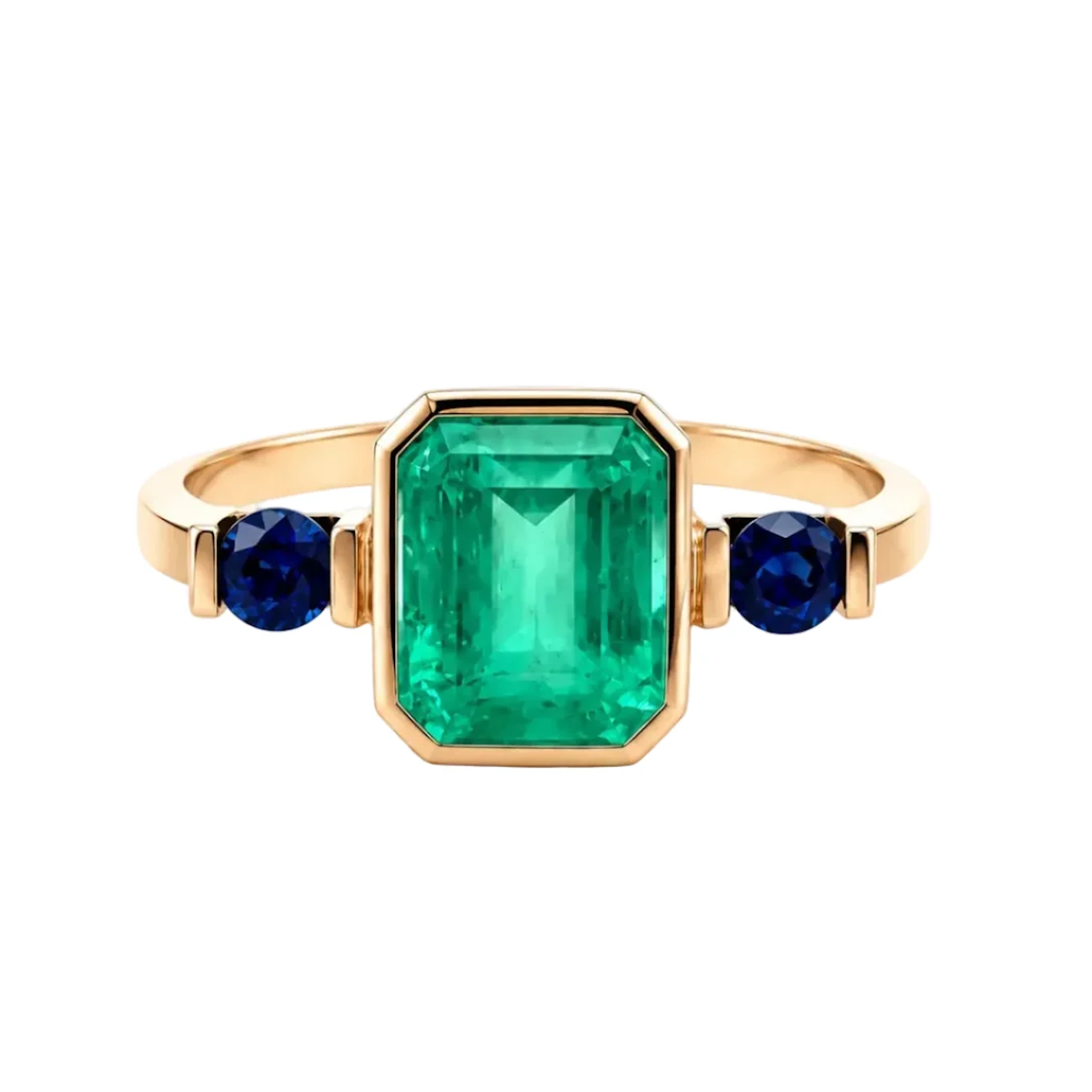 Trilogy Ring in yellow gold, emerald, and sapphires