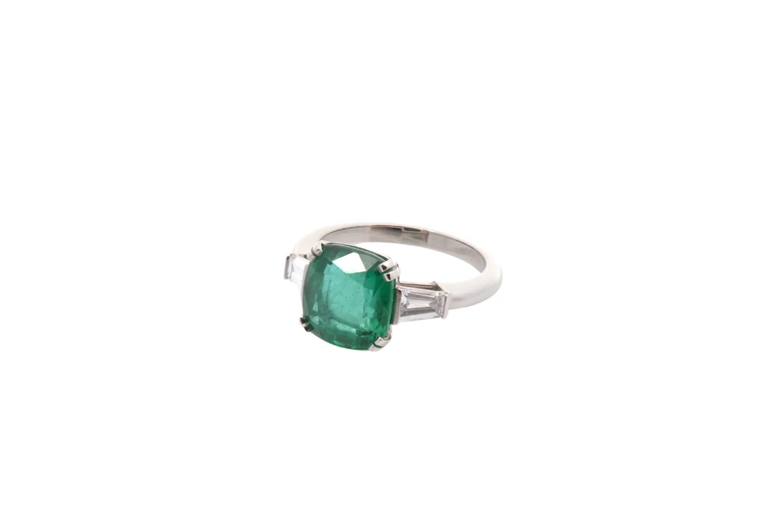 Trilogy Ring in Platinum, Emerald, and Diamonds