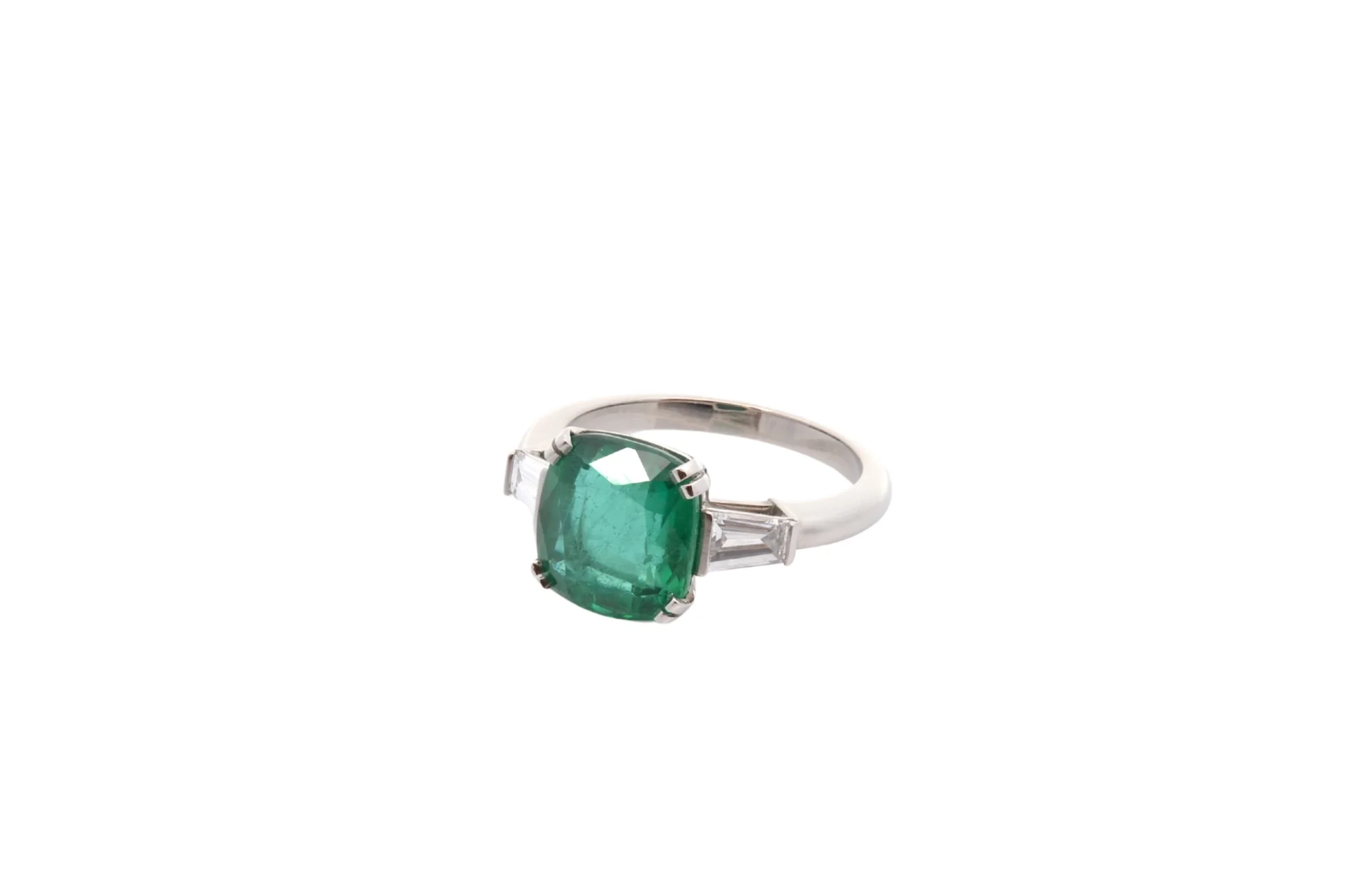 Trilogy Ring in Platinum, Emerald, and Diamonds