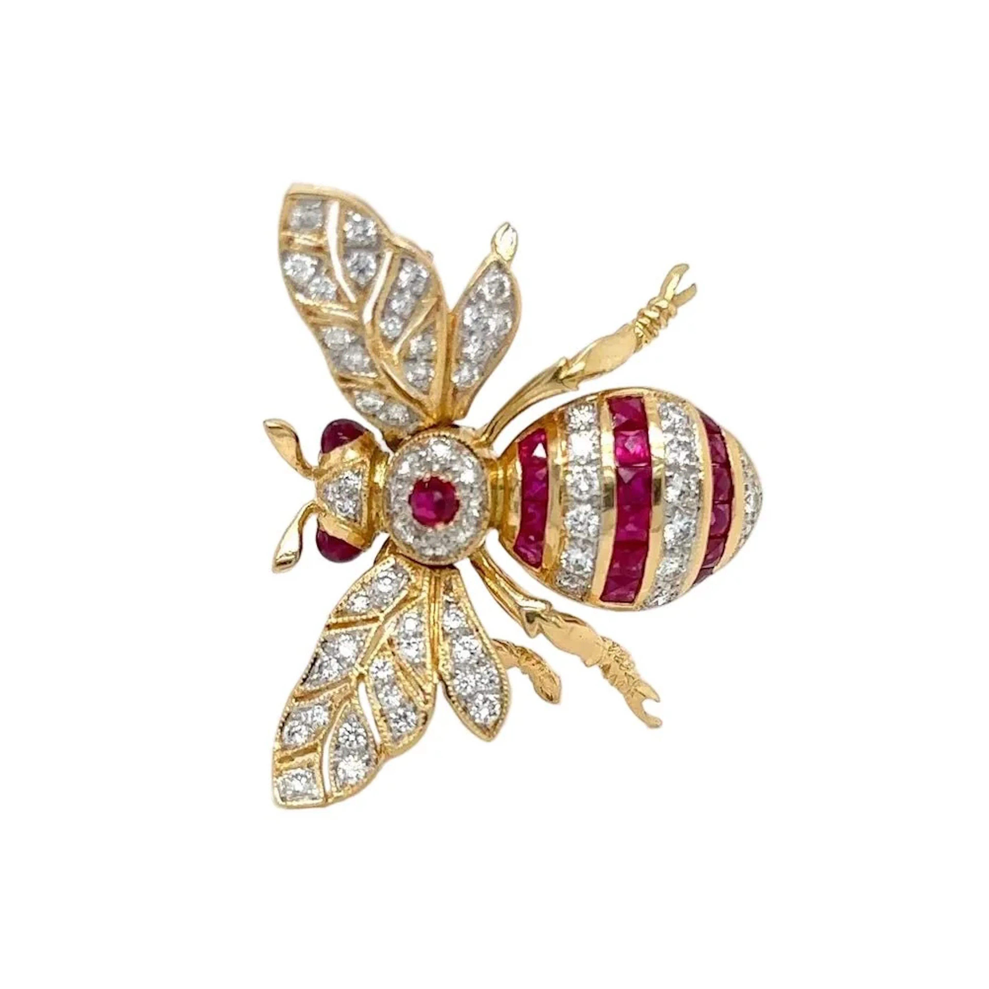Yellow gold brooch with rubies and diamonds