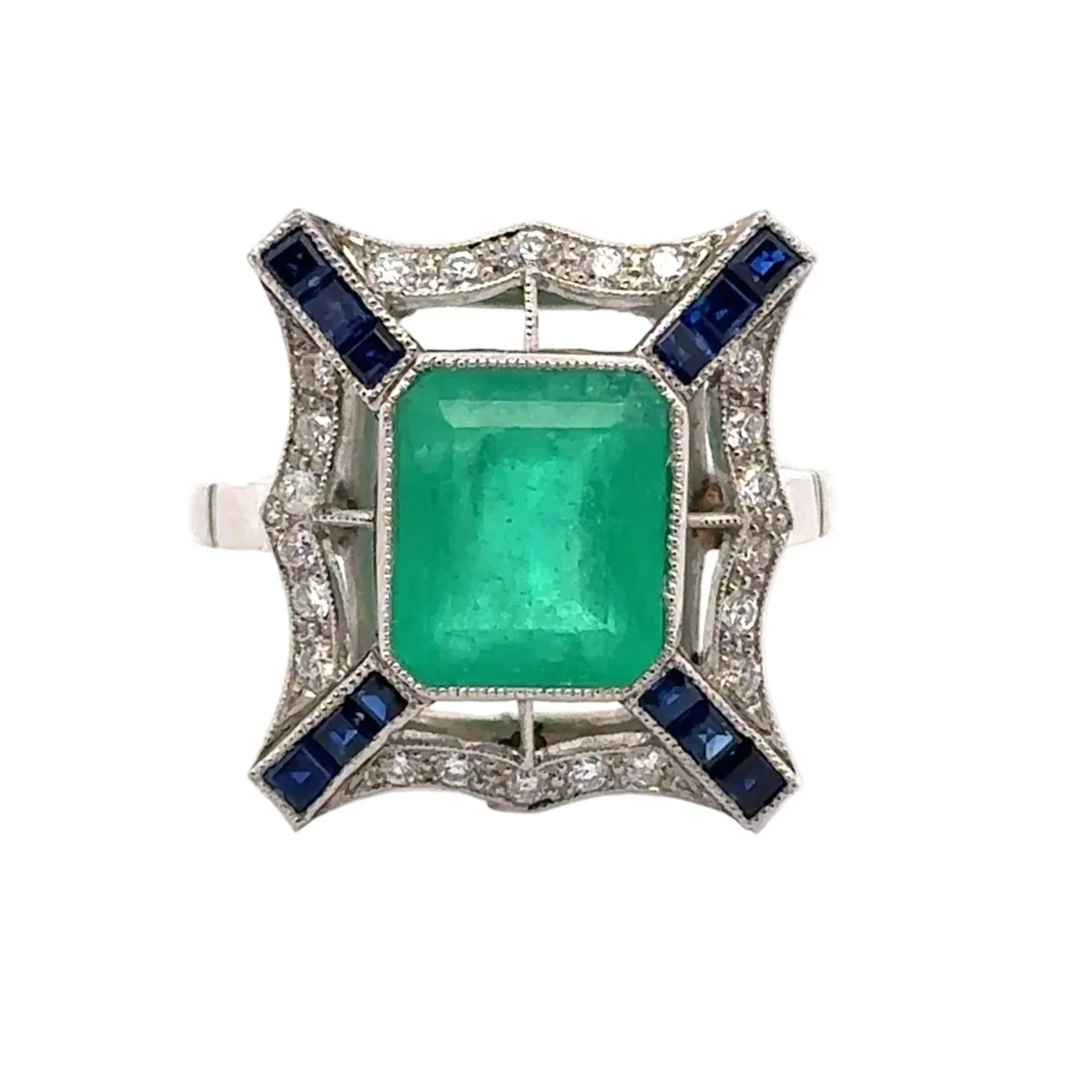 Entourage Ring in Platinum, Emerald, and Diamonds