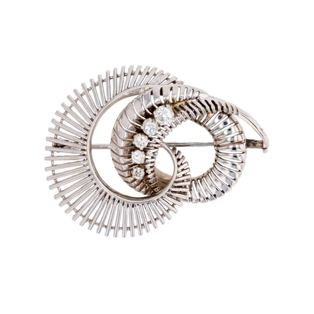 Brooch spiral in white gold and diamonds.