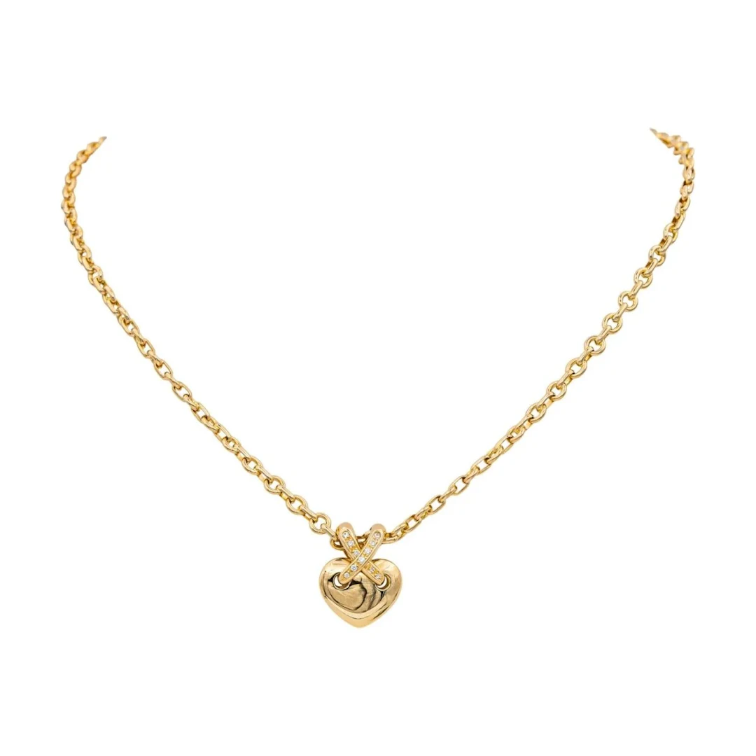 Collier Pendentif CHAUMET "Coeur Lien" en or jaune et diamants