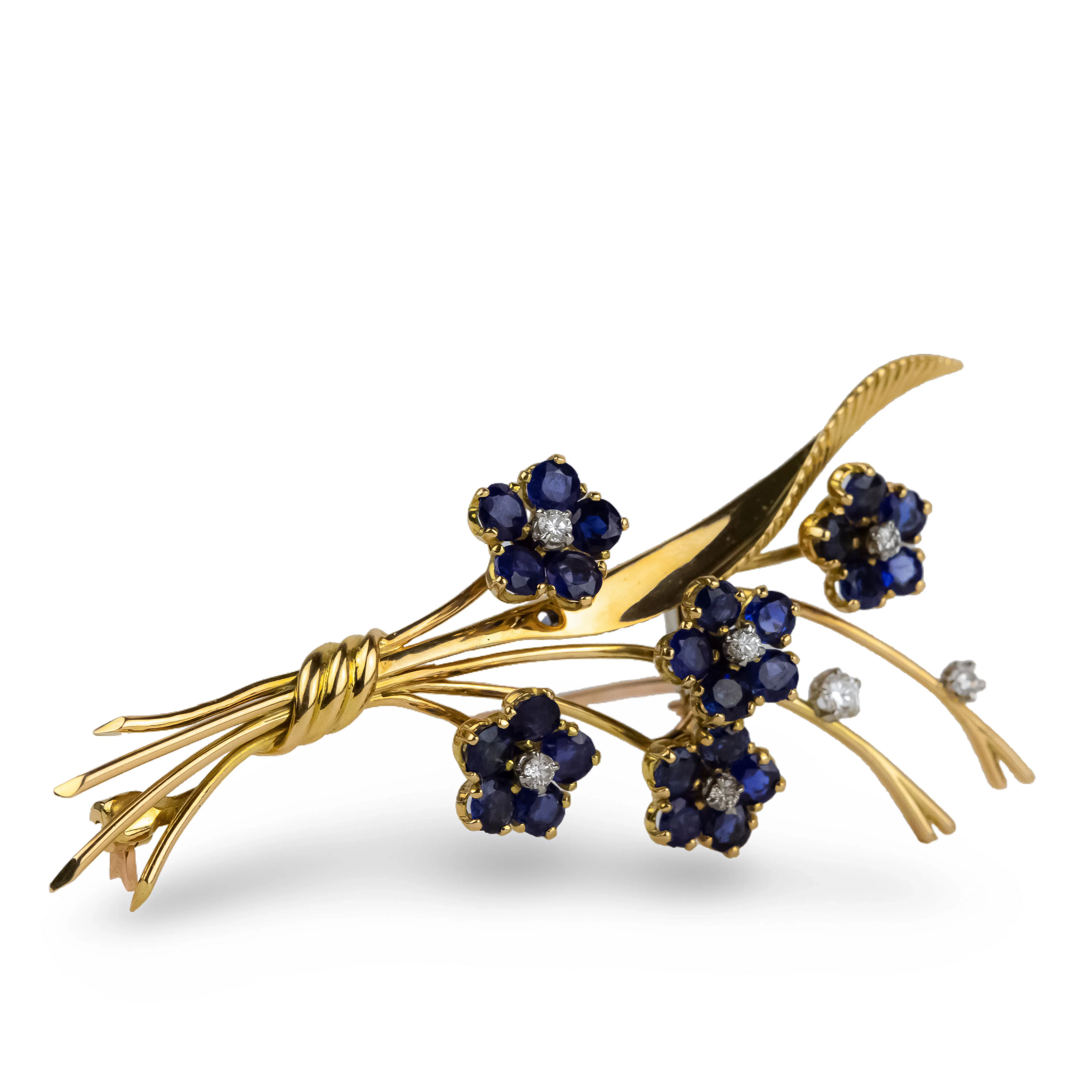 VAN CLEEF & ARPELS “Bouquet de fleurs” clip brooch in yellow gold and sapphires