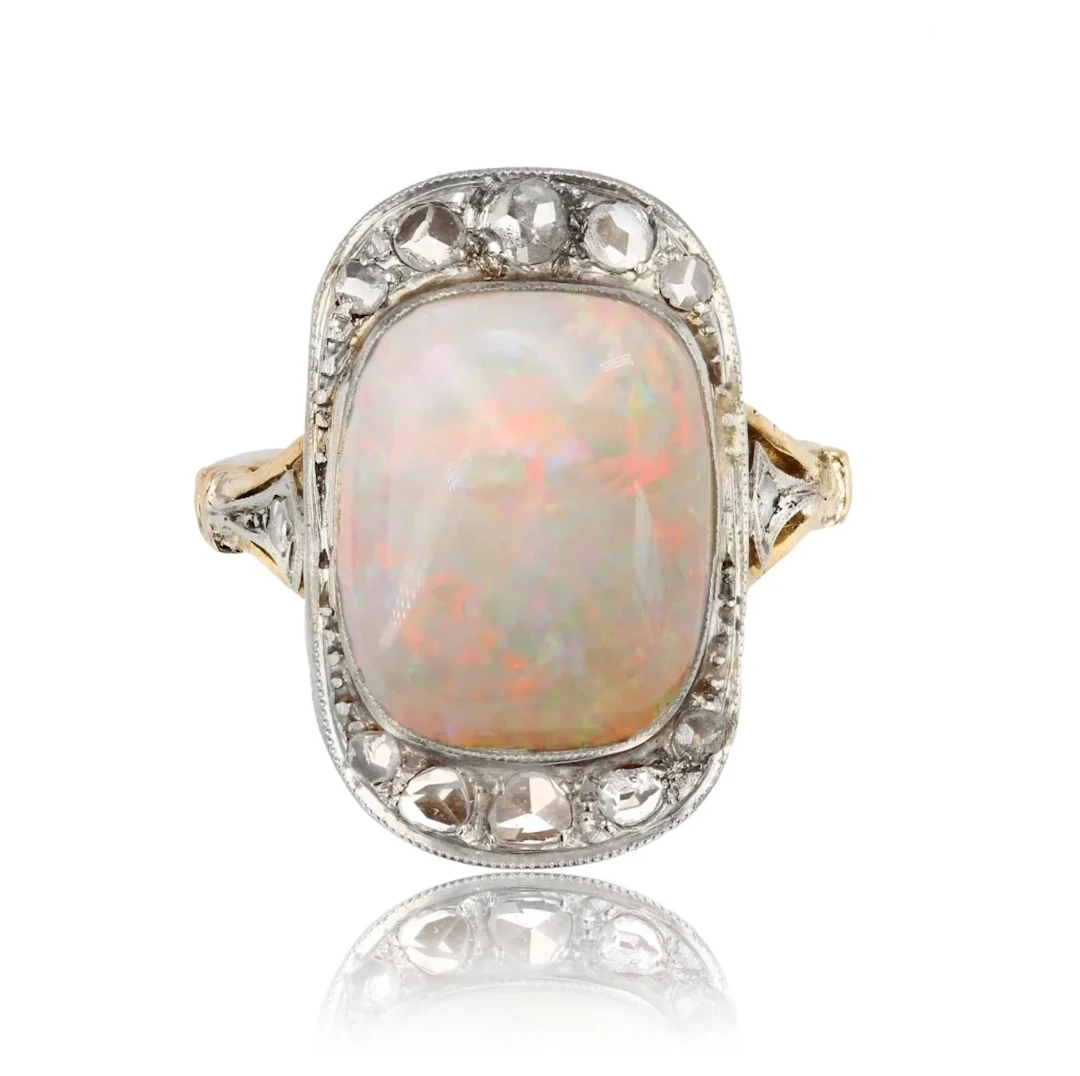 Entourage ring in yellow gold, platinum, opal and diamonds
