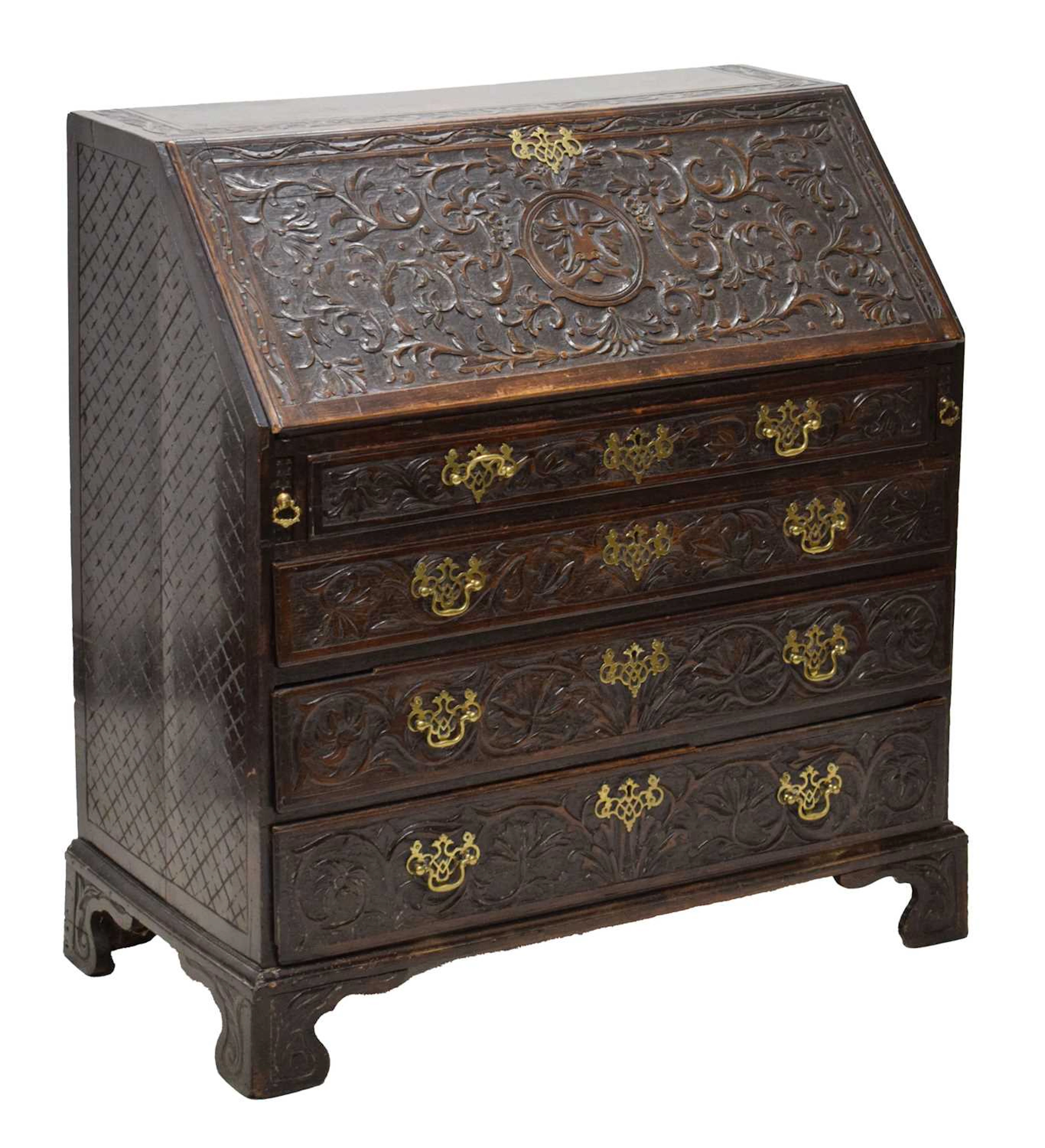 George III oak bureau, with later carved decoration
