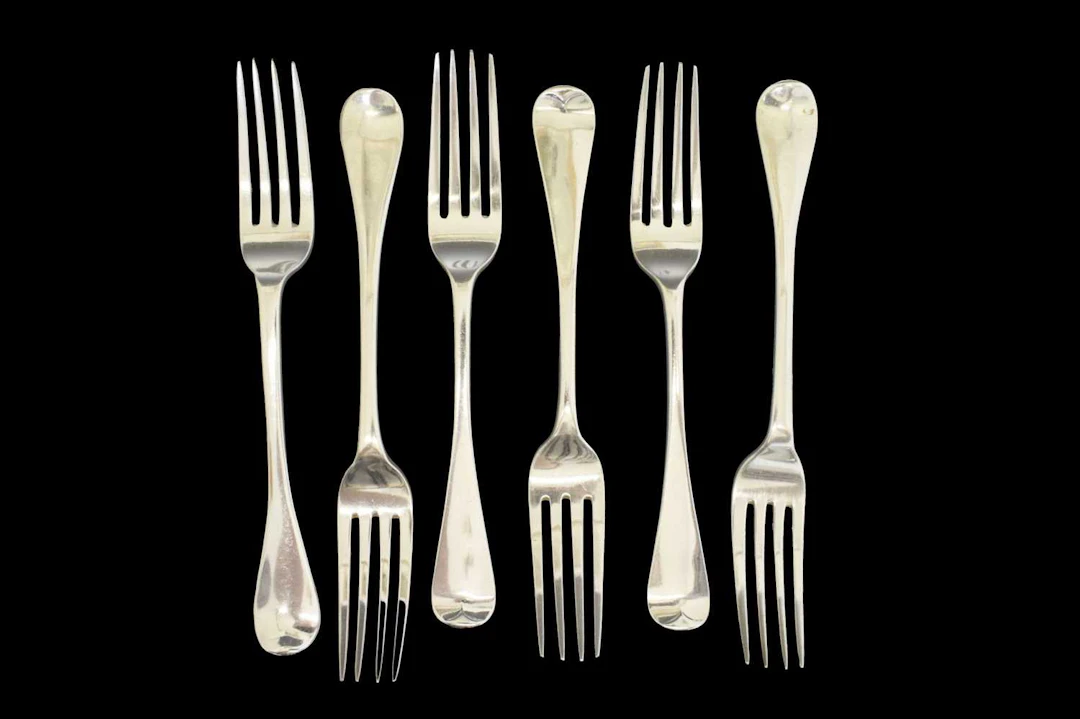 Matched set of six silver Old English pattern table forks