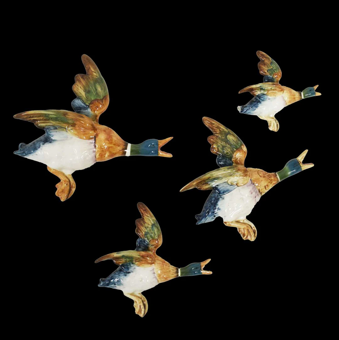 Set of four Beswick pottery flying Mallard ducks