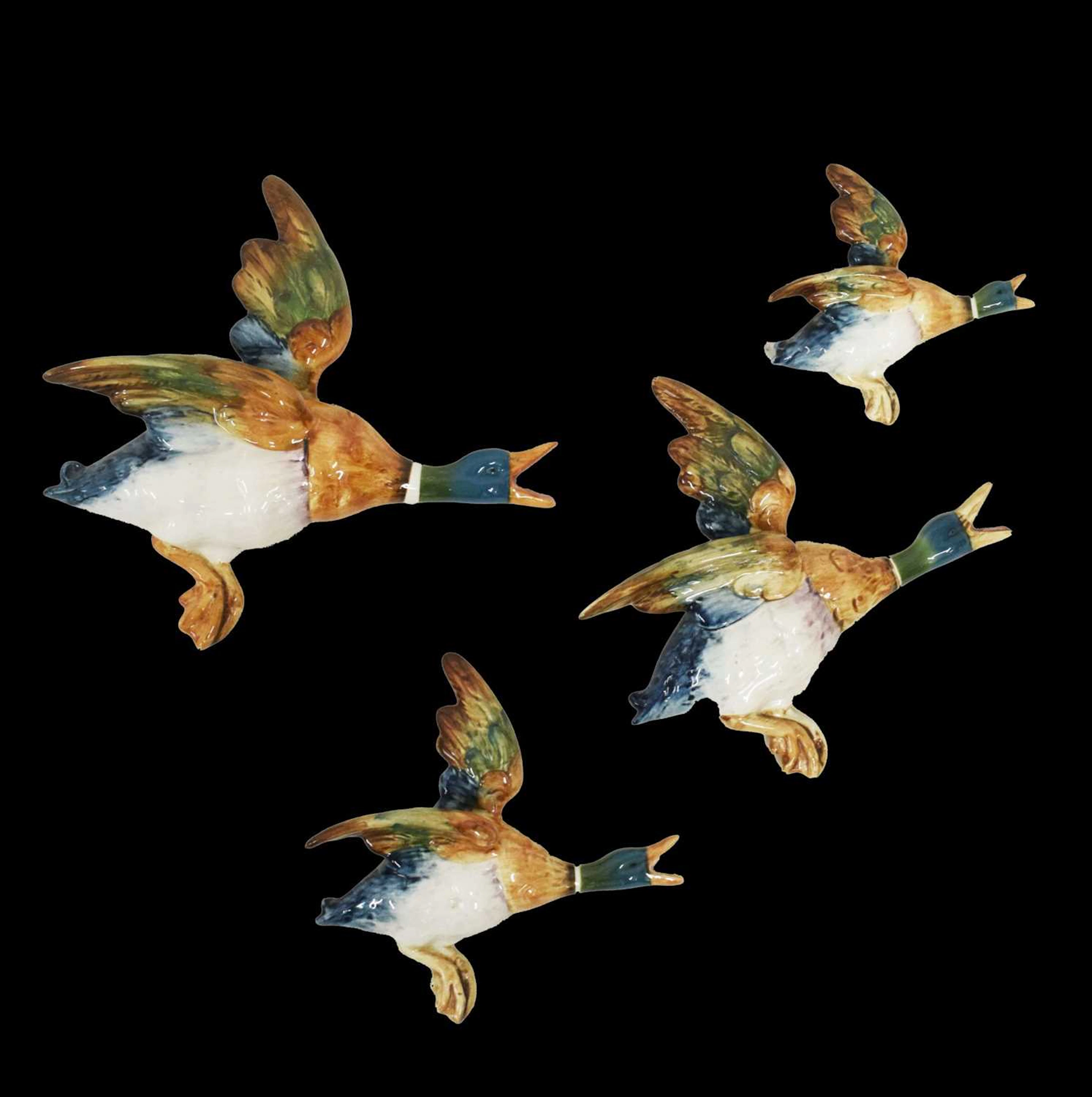 Set of four Beswick pottery flying Mallard ducks