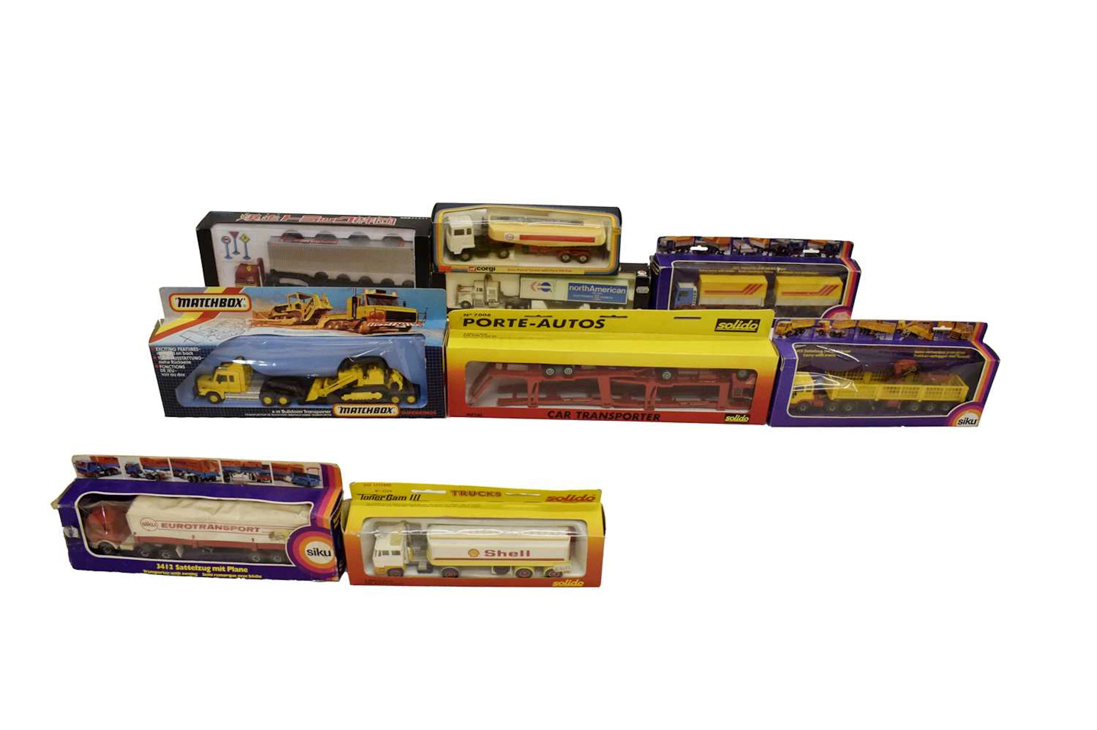 Mixed collection of boxed diecast model vehicles