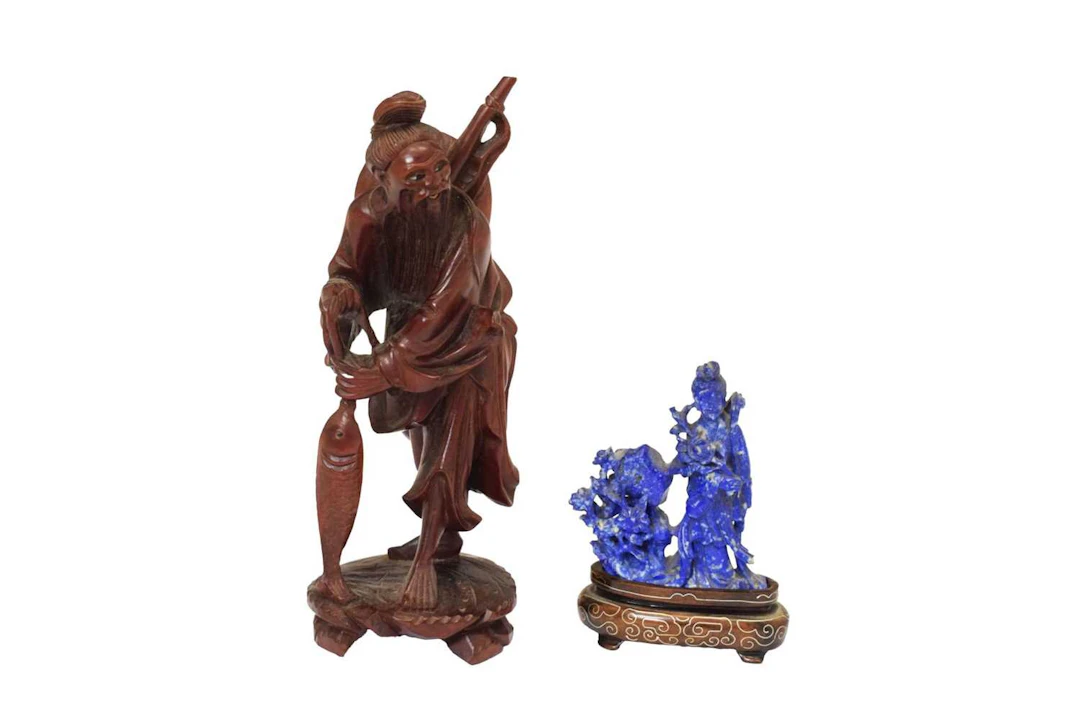 Chinese carved blue stone figure of Guanyin with flowers