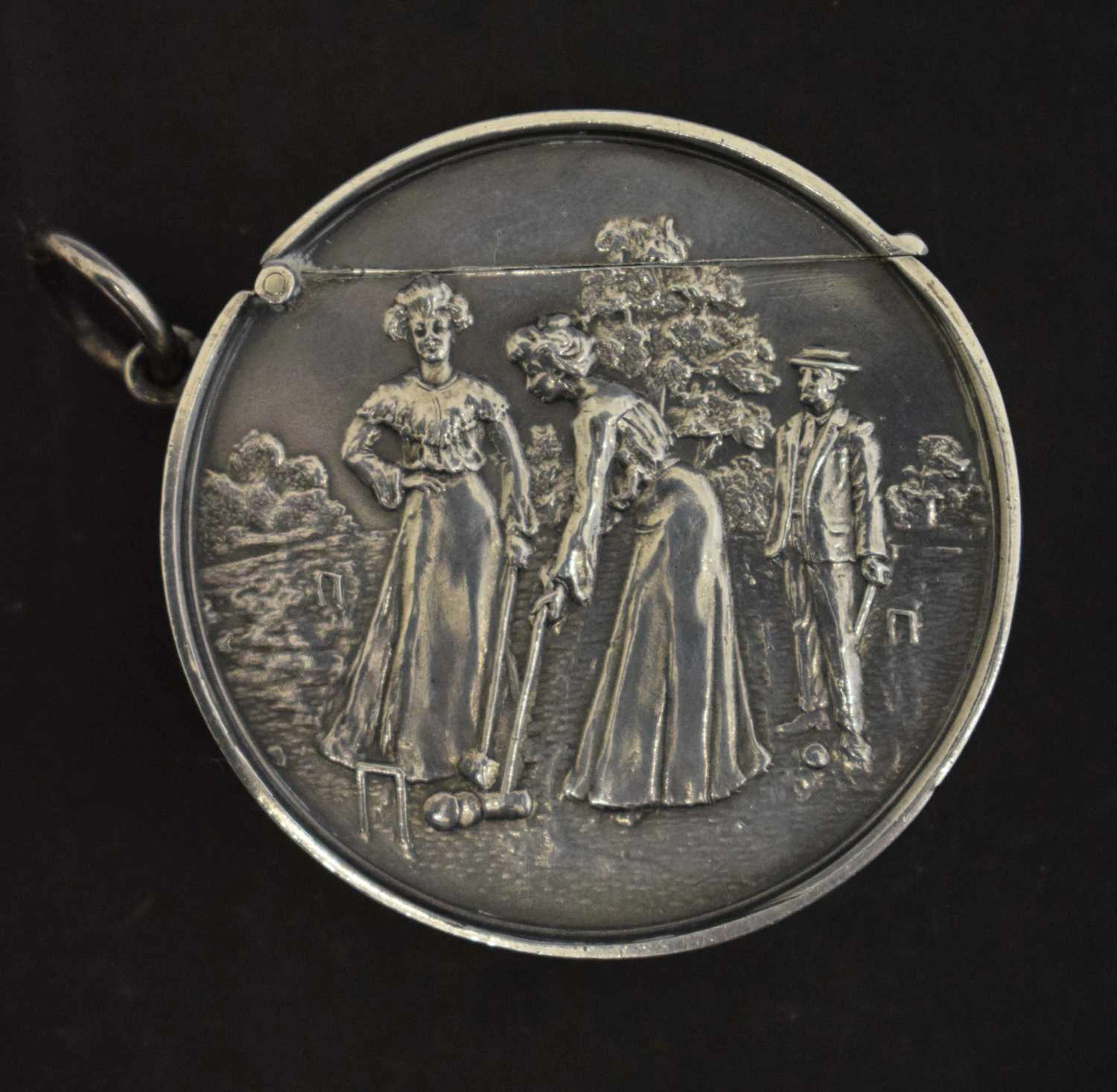 Edward VII silver vesta case of circular form, with a relief panel