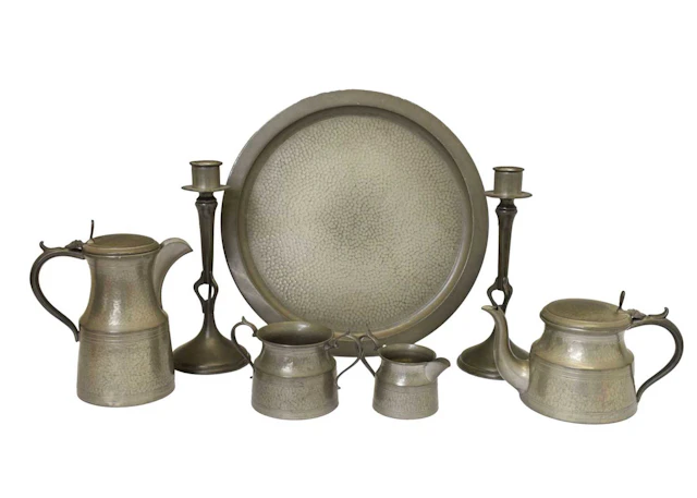 Pair of Art Nouveau pewter candlesticks together with a Cornish Pewter tea set
