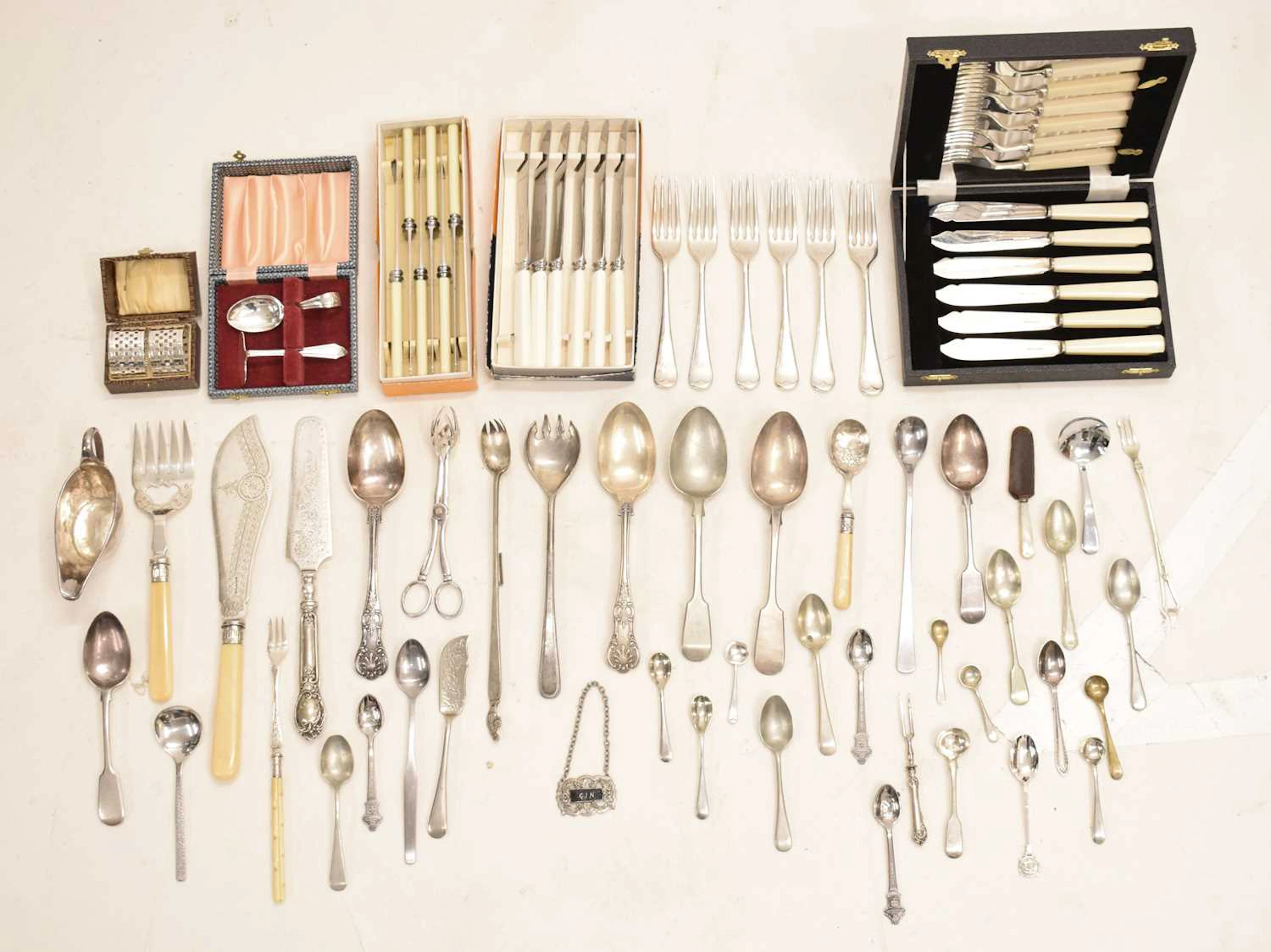 A collection of silver plate to include Harrods retail flatwear, Rolex