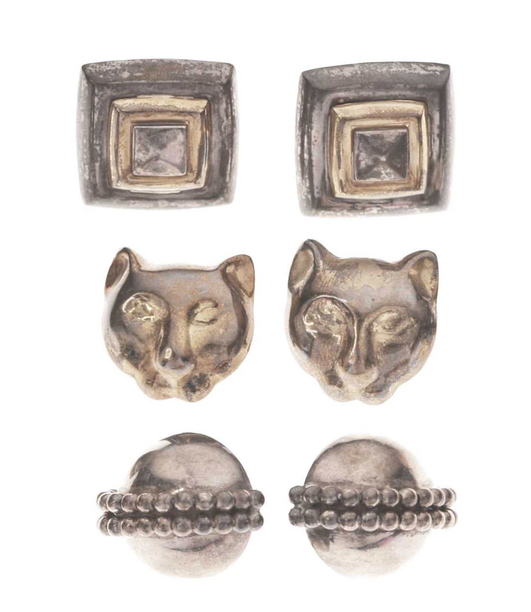 Folli Follie, London - Three pairs of vintage silver earrings