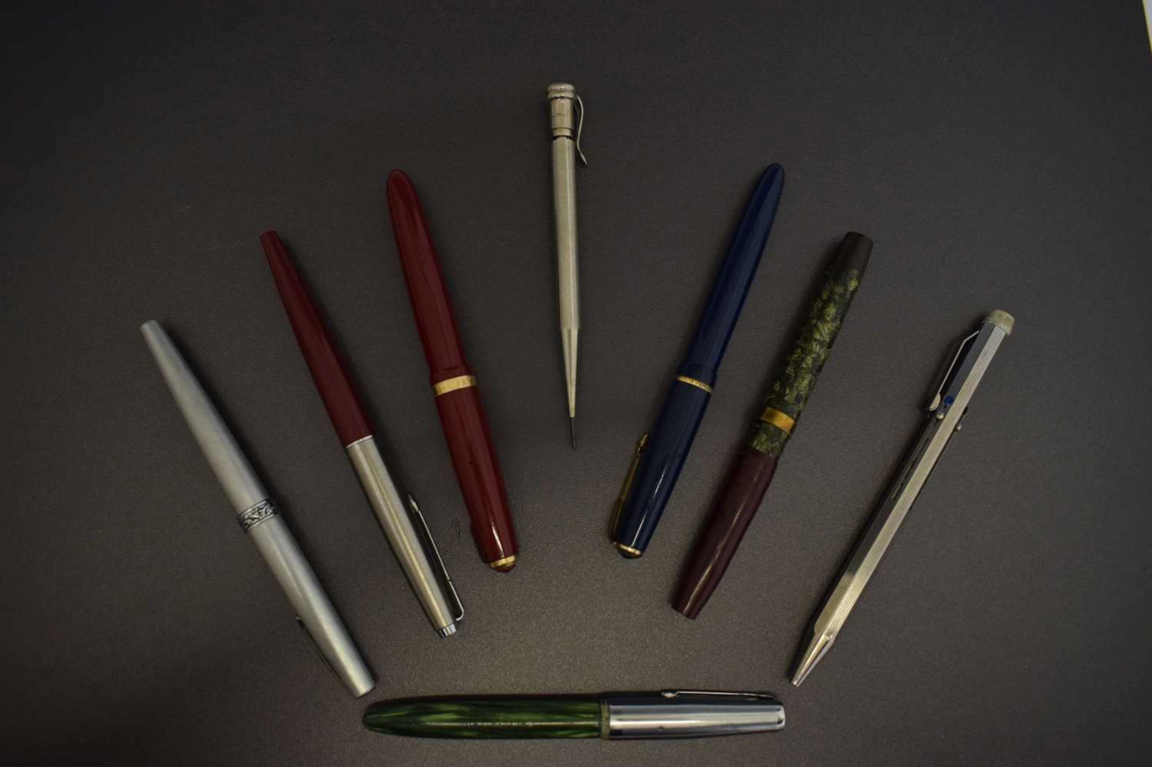 Collection of vintage fountain pens and mechanical pencils