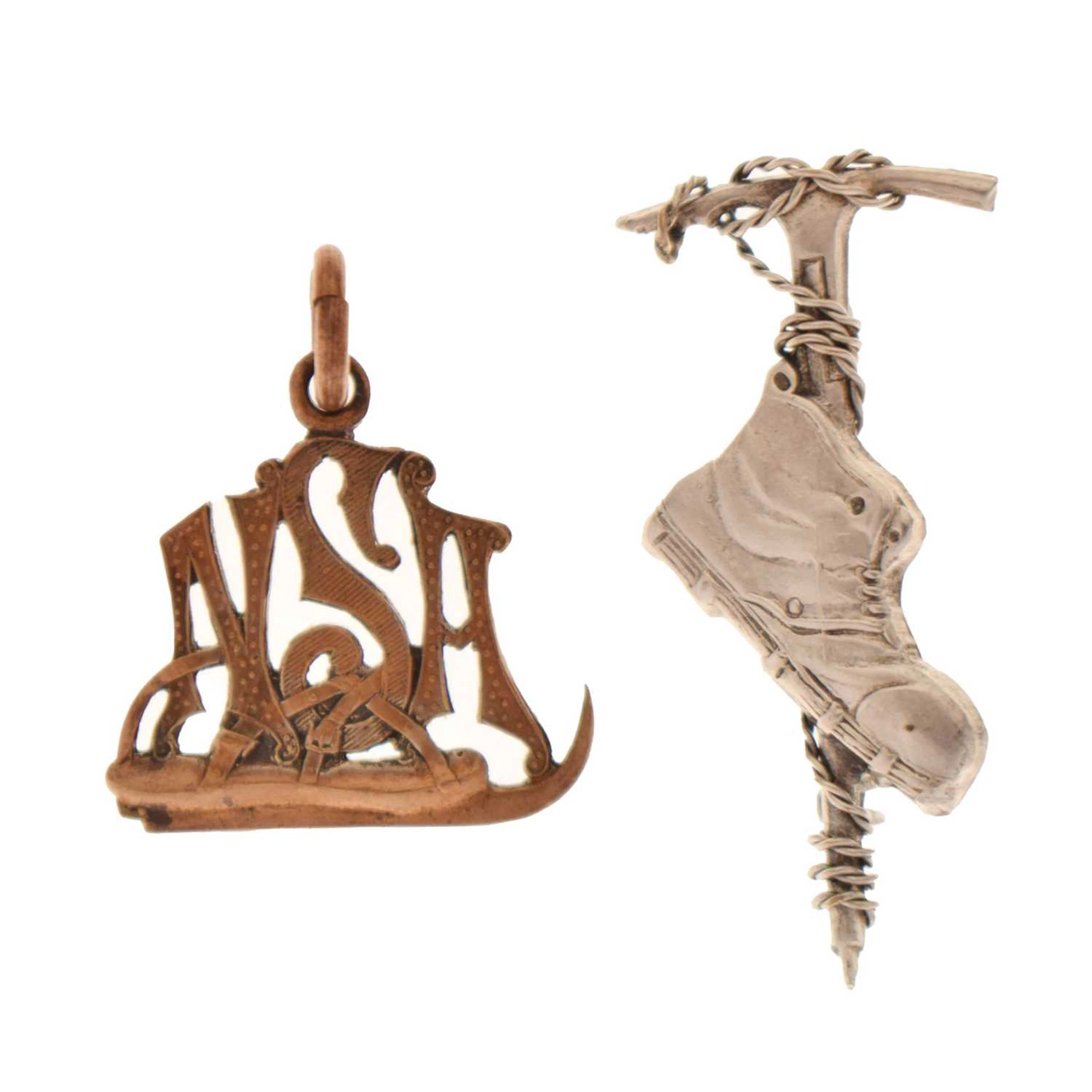 White metal mountaineering brooch and a National Skating Association