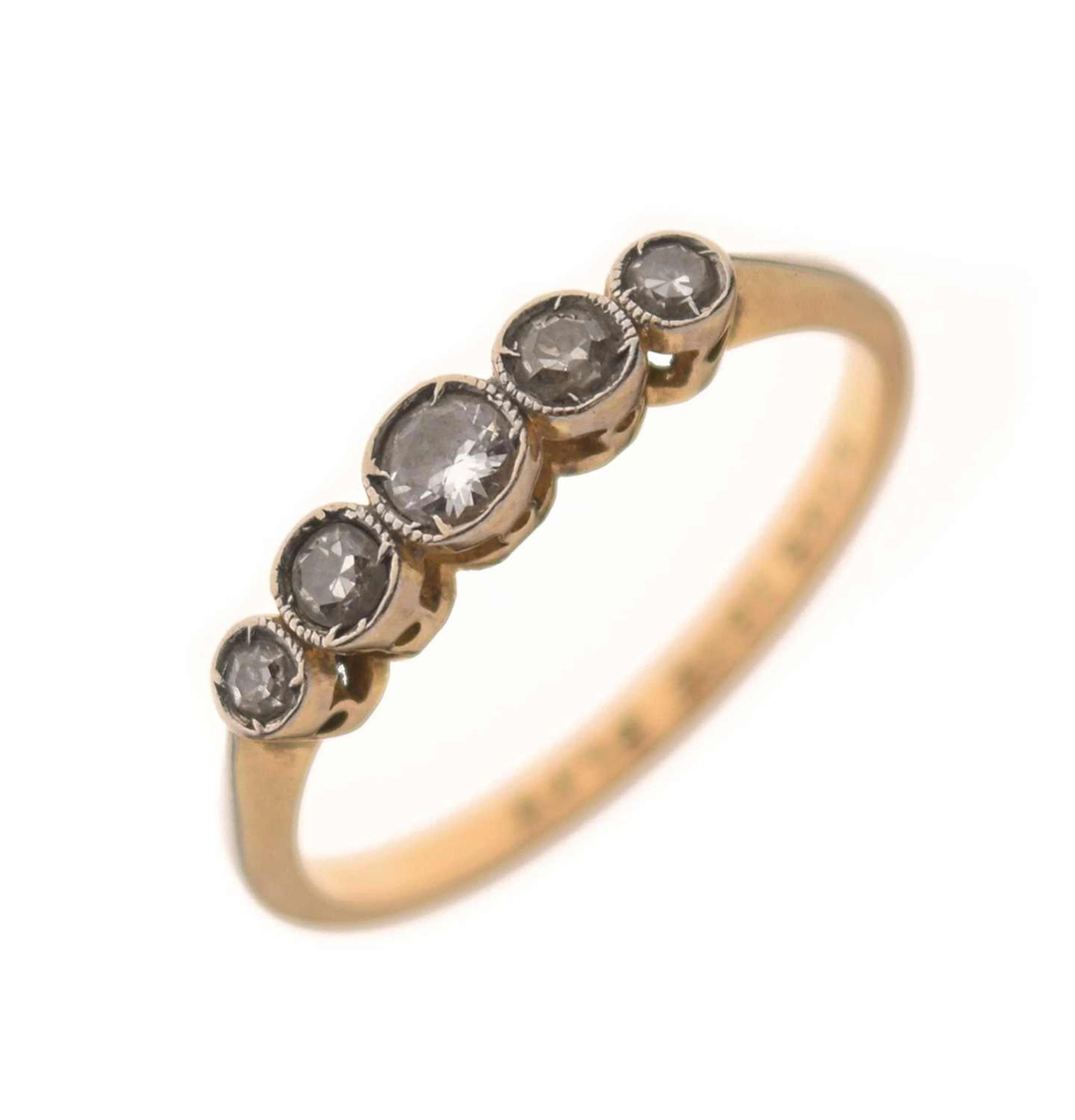 Diamond five-stone yellow metal ring