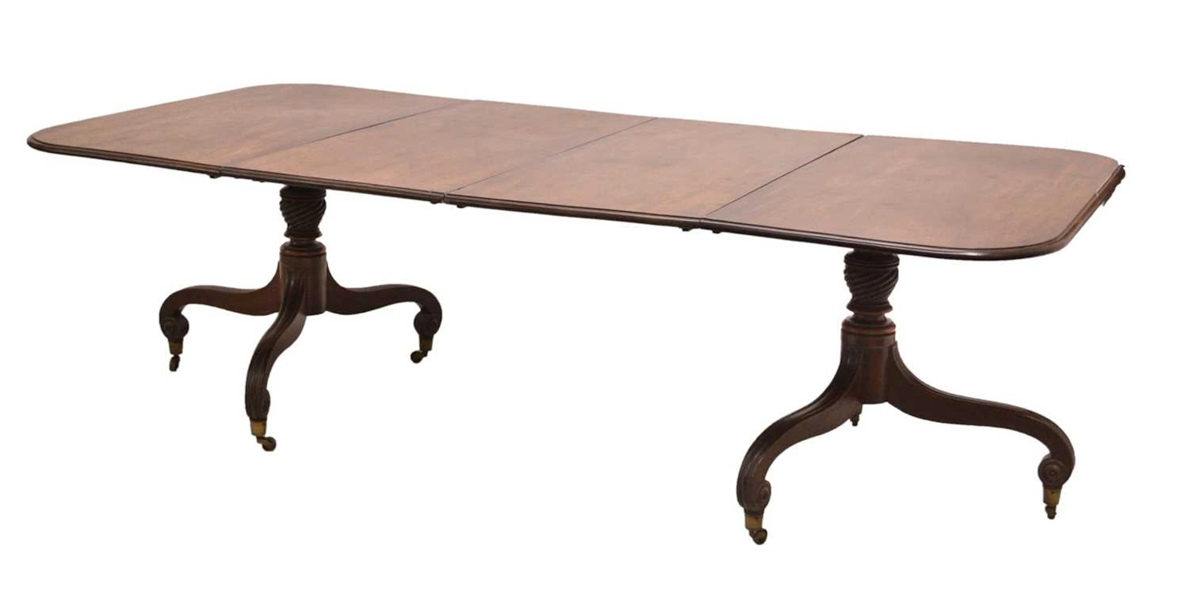 George IV mahogany twin pillar dining table