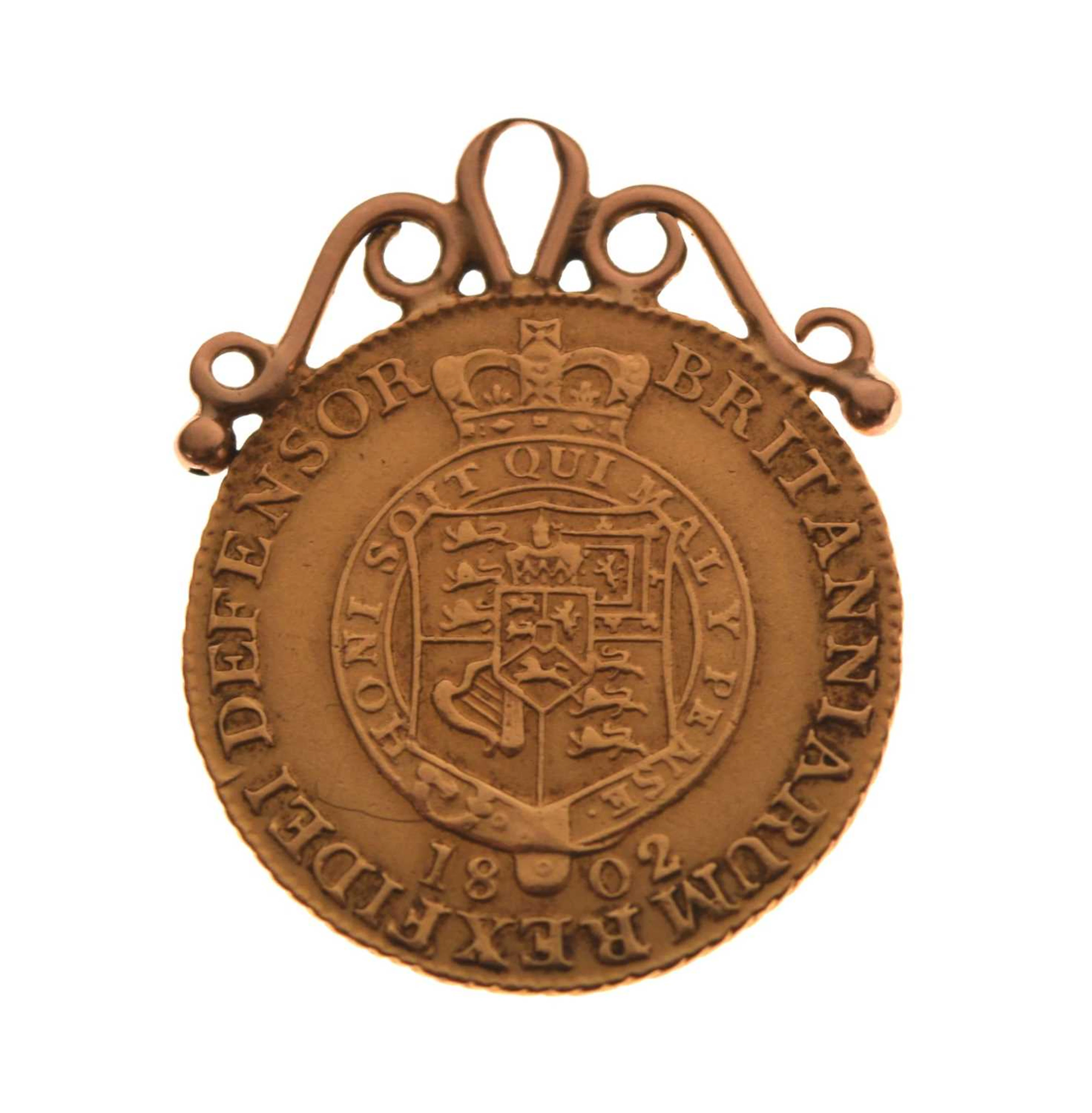 George III gold half guinea, 1802, with a yellow metal soldered mount