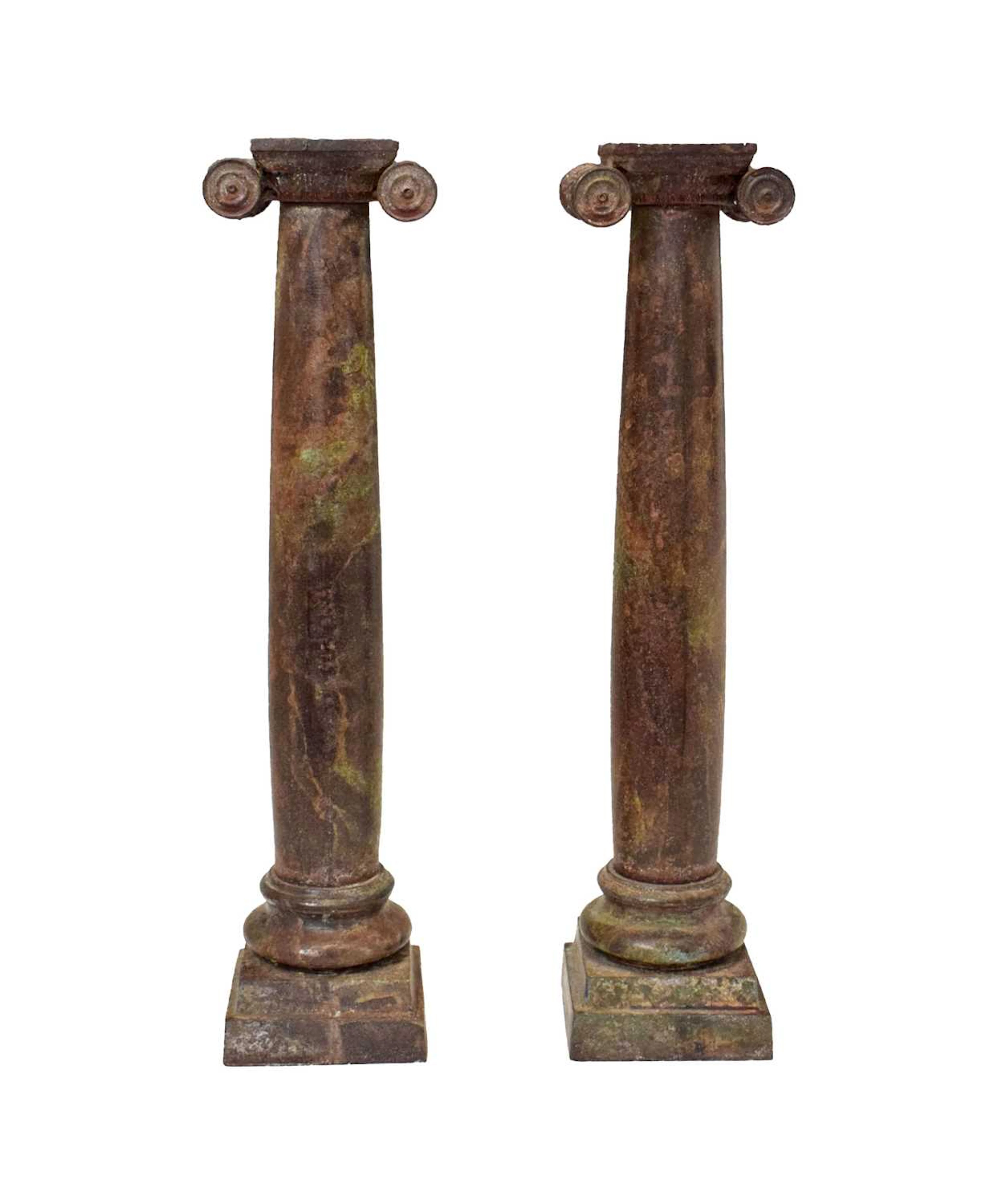 Pair of cast brass Ionic column marble-effect candlesticks