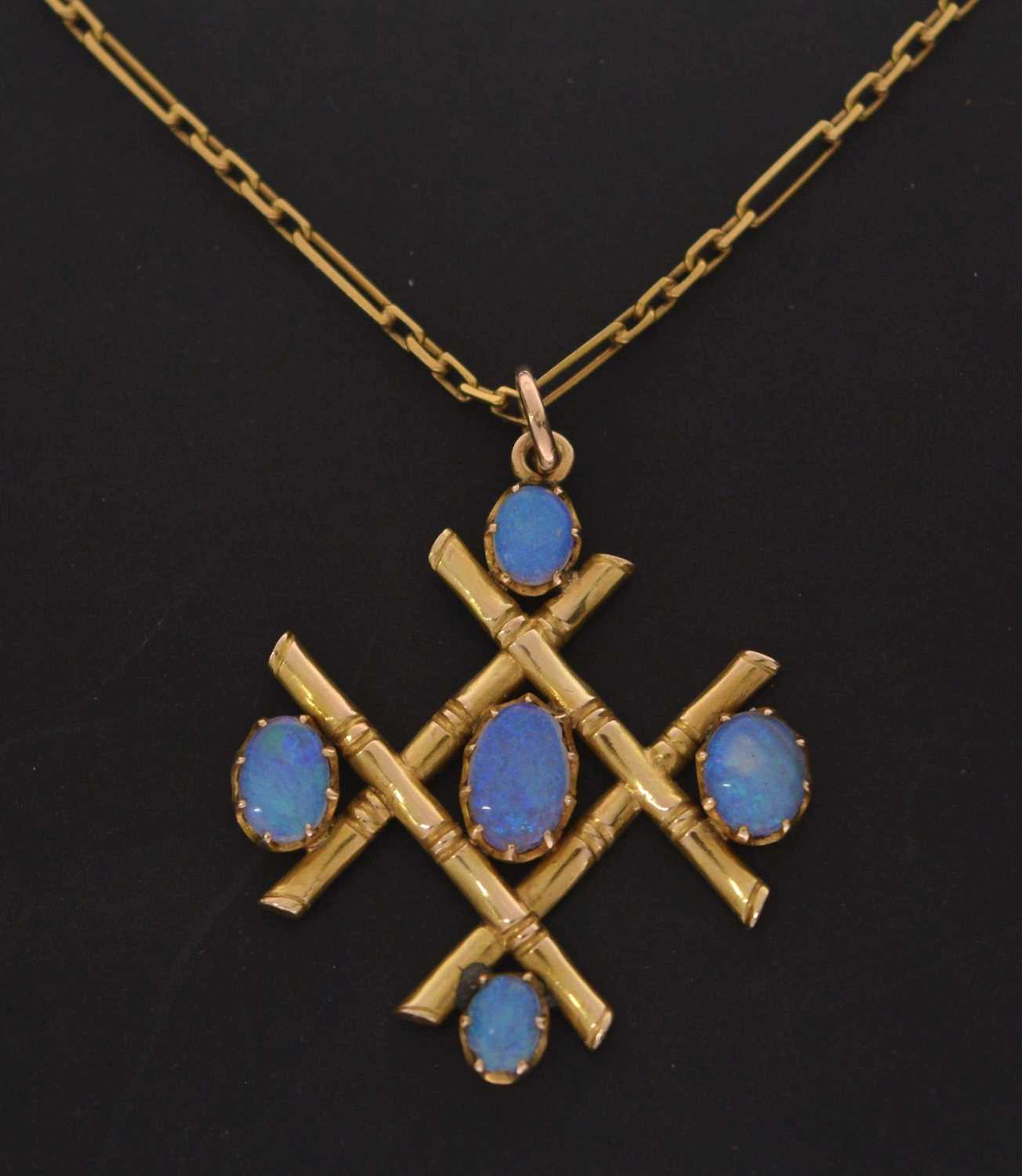 Yellow metal opal pendant necklace
