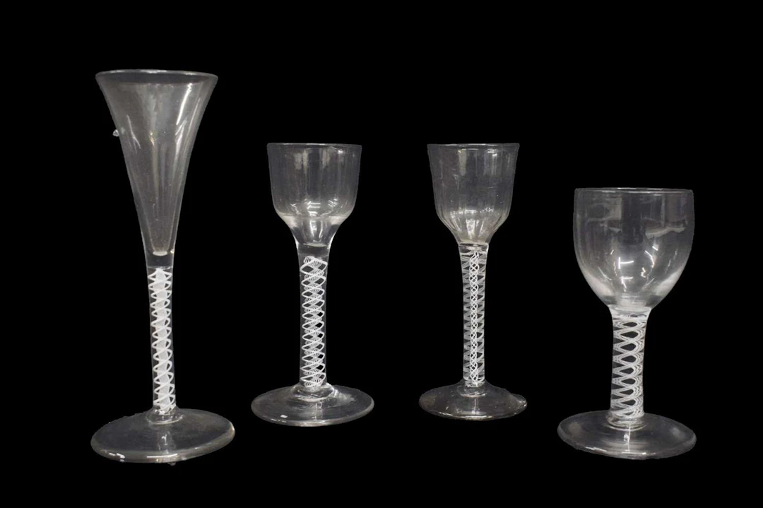 Group of four opaque twist stem glasses