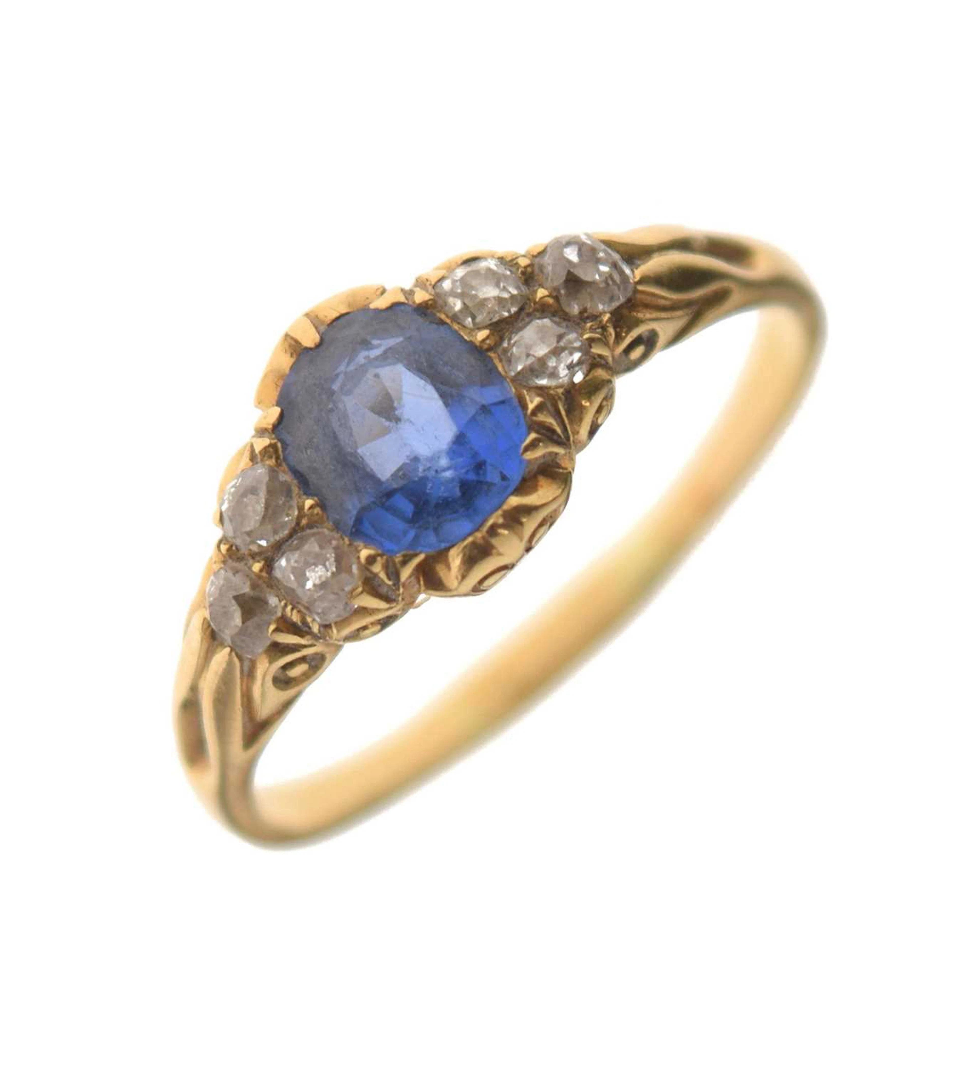 Diamond and sapphire set unmarked yellow metal ring
