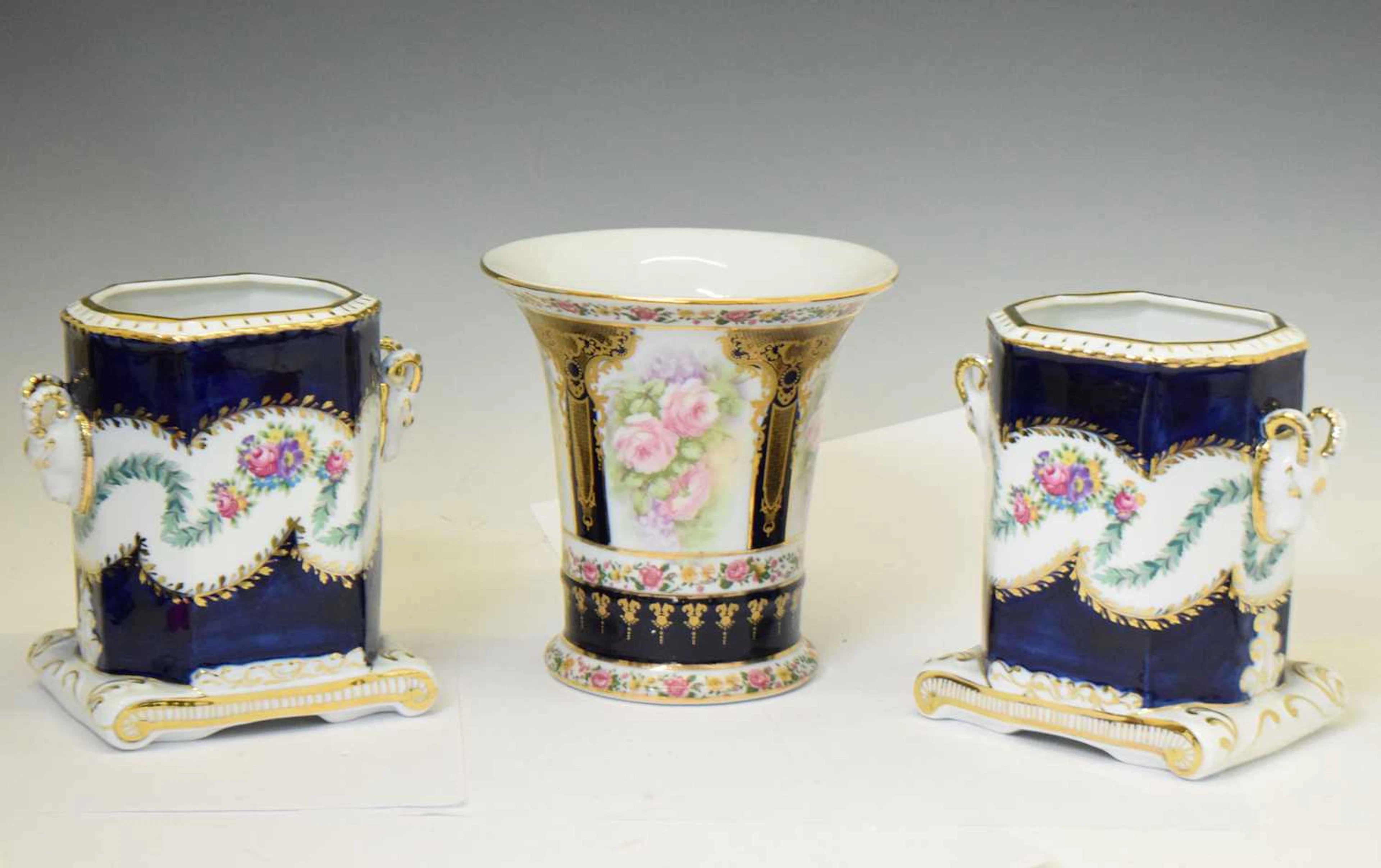 Pair of Meissen style cachepot, and a similar trumpet-shaped vase