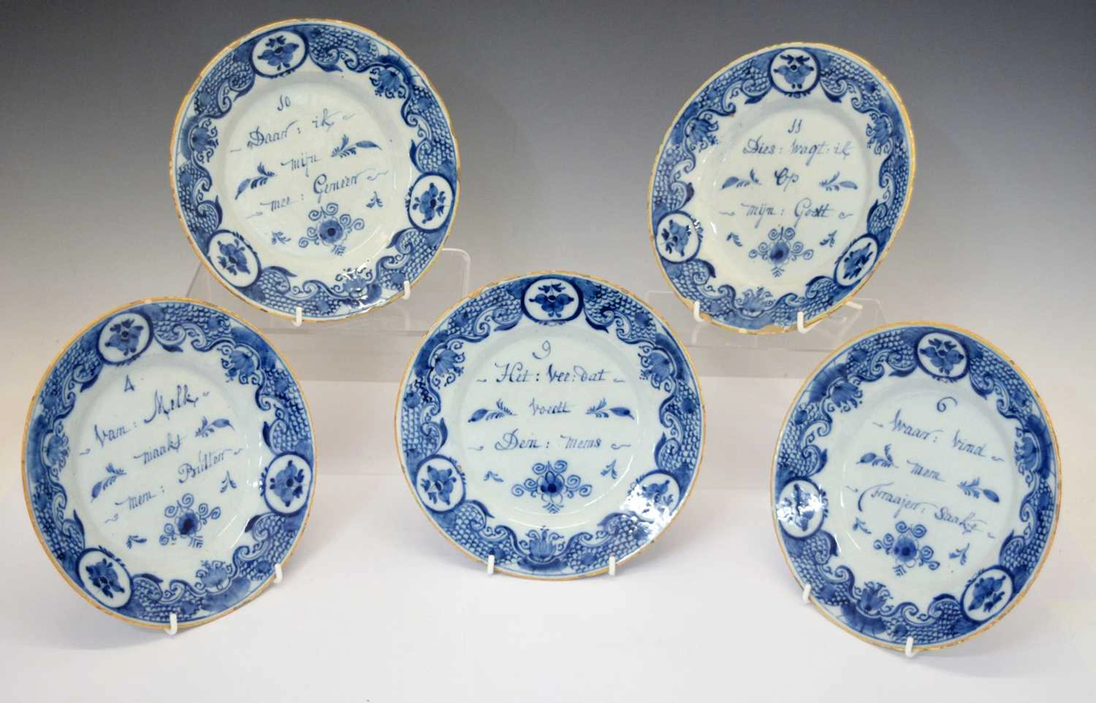 Set of five numbered mid 18th century Dutch Delft tavern plates, Johannes