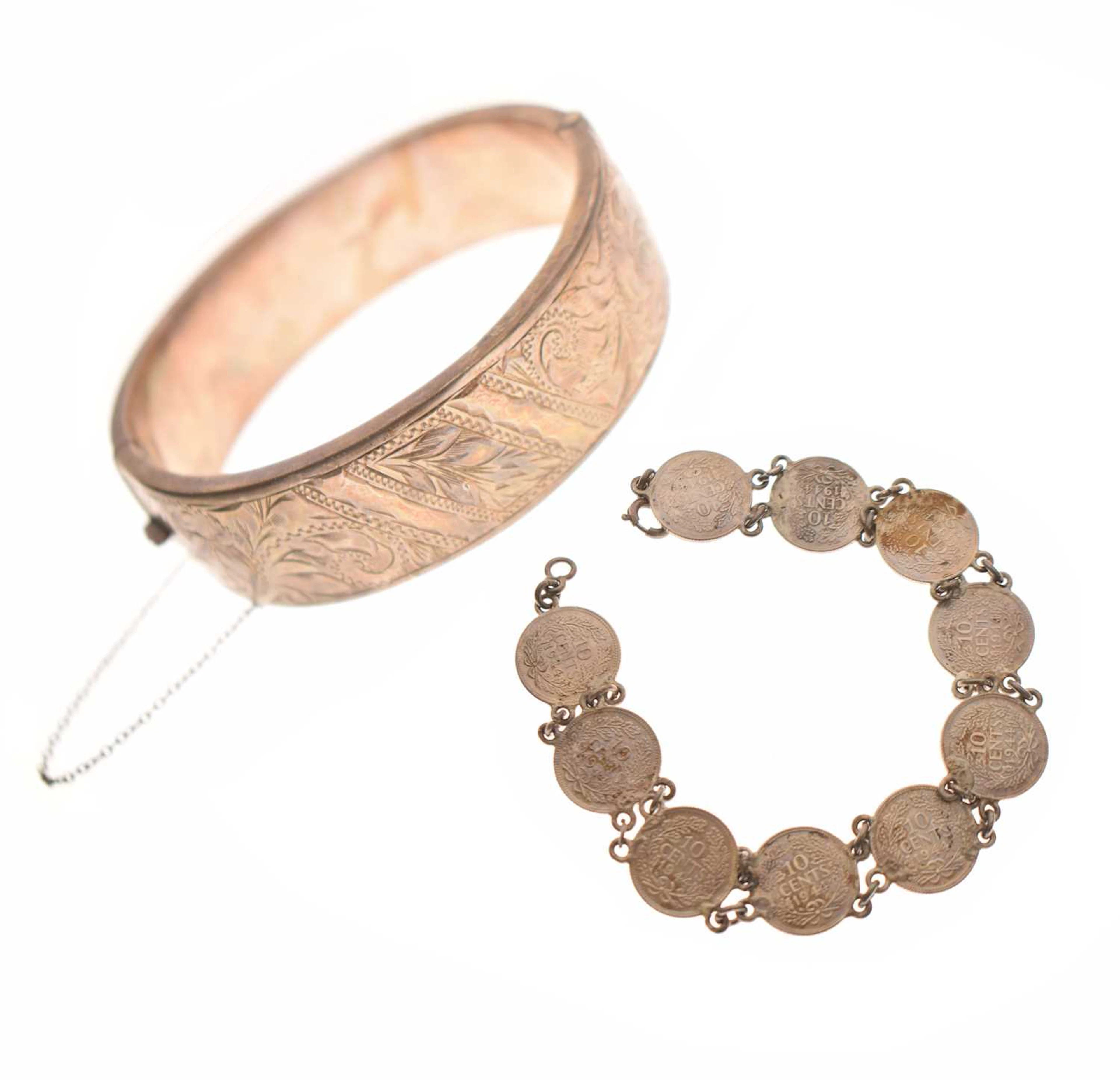 Elizabeth II silver snap bangle together with a white metal 10 cent