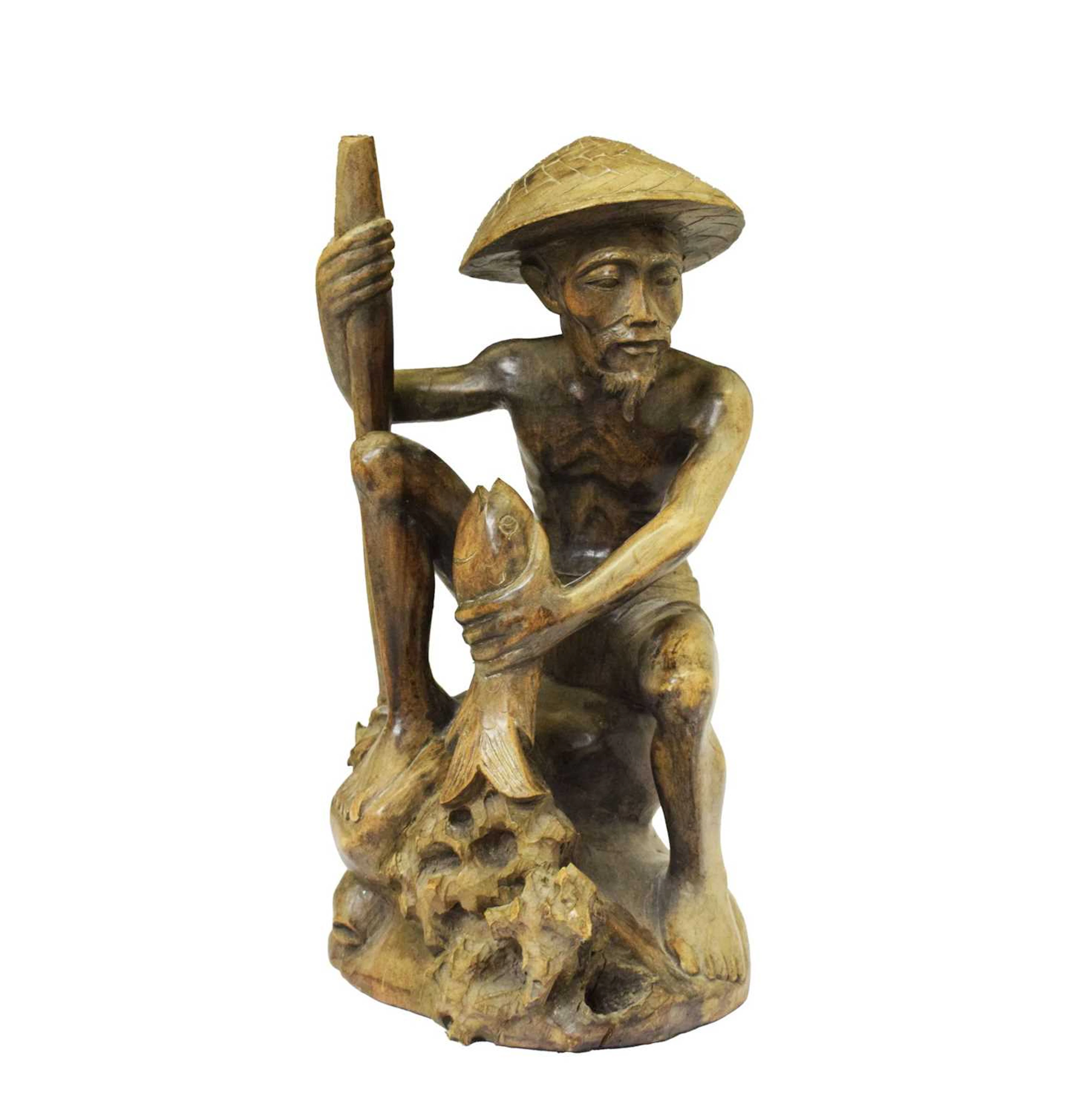 East Asian carved wooden figure of a fisherman