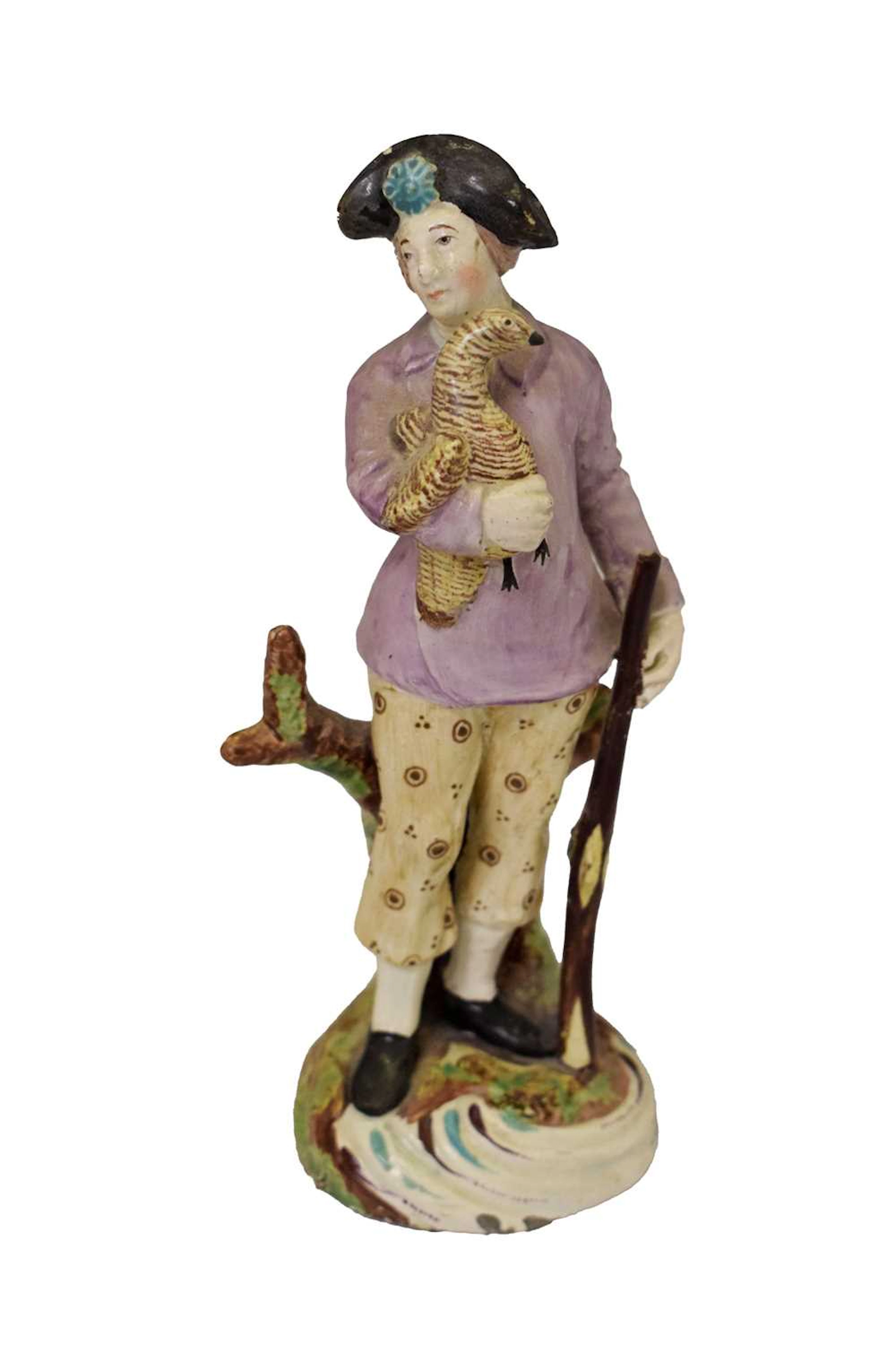 Late 18th century Staffordshire pearlware figure of a falconer