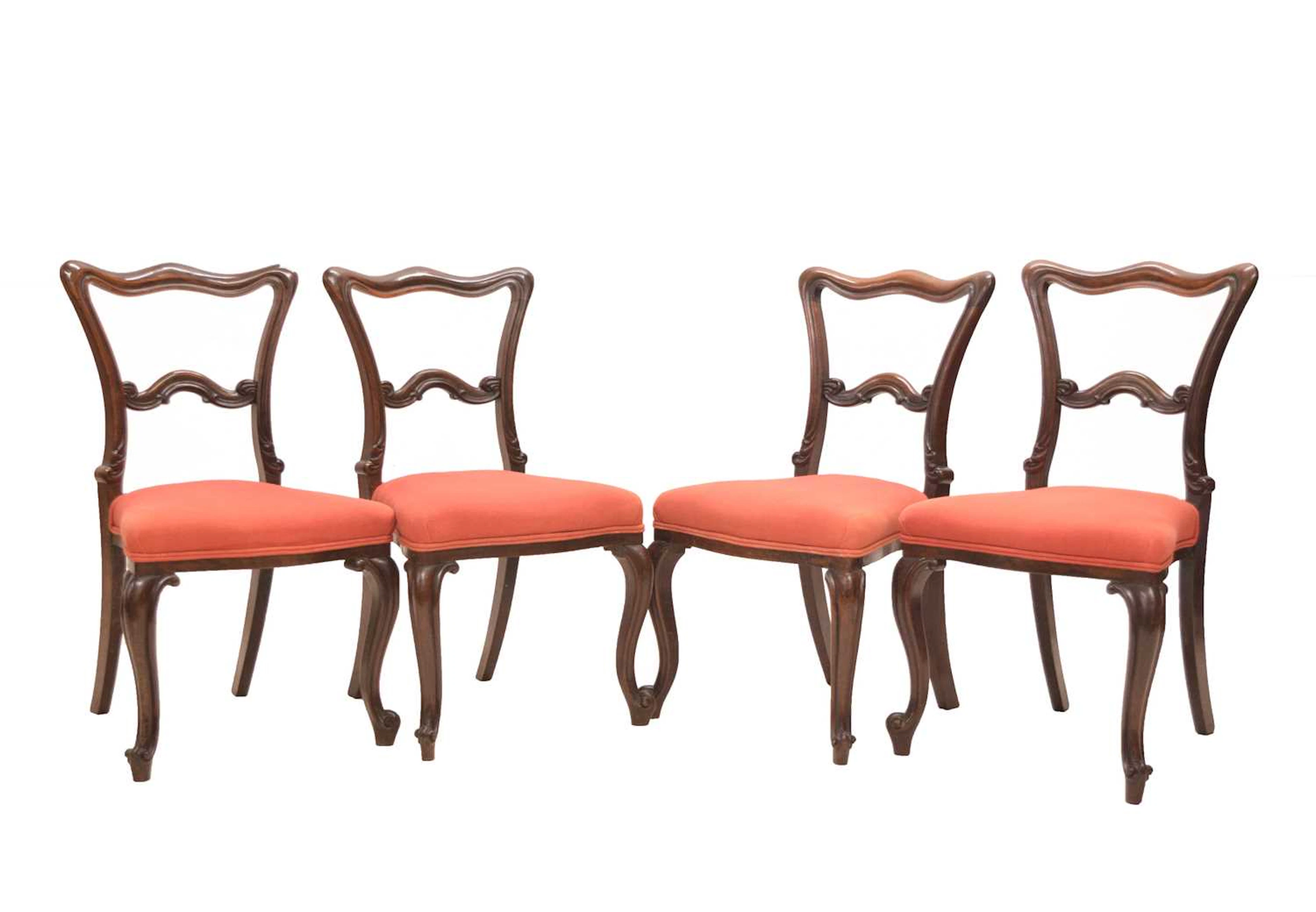 Set of four Victorian rosewood buckle back dining or salon chairs