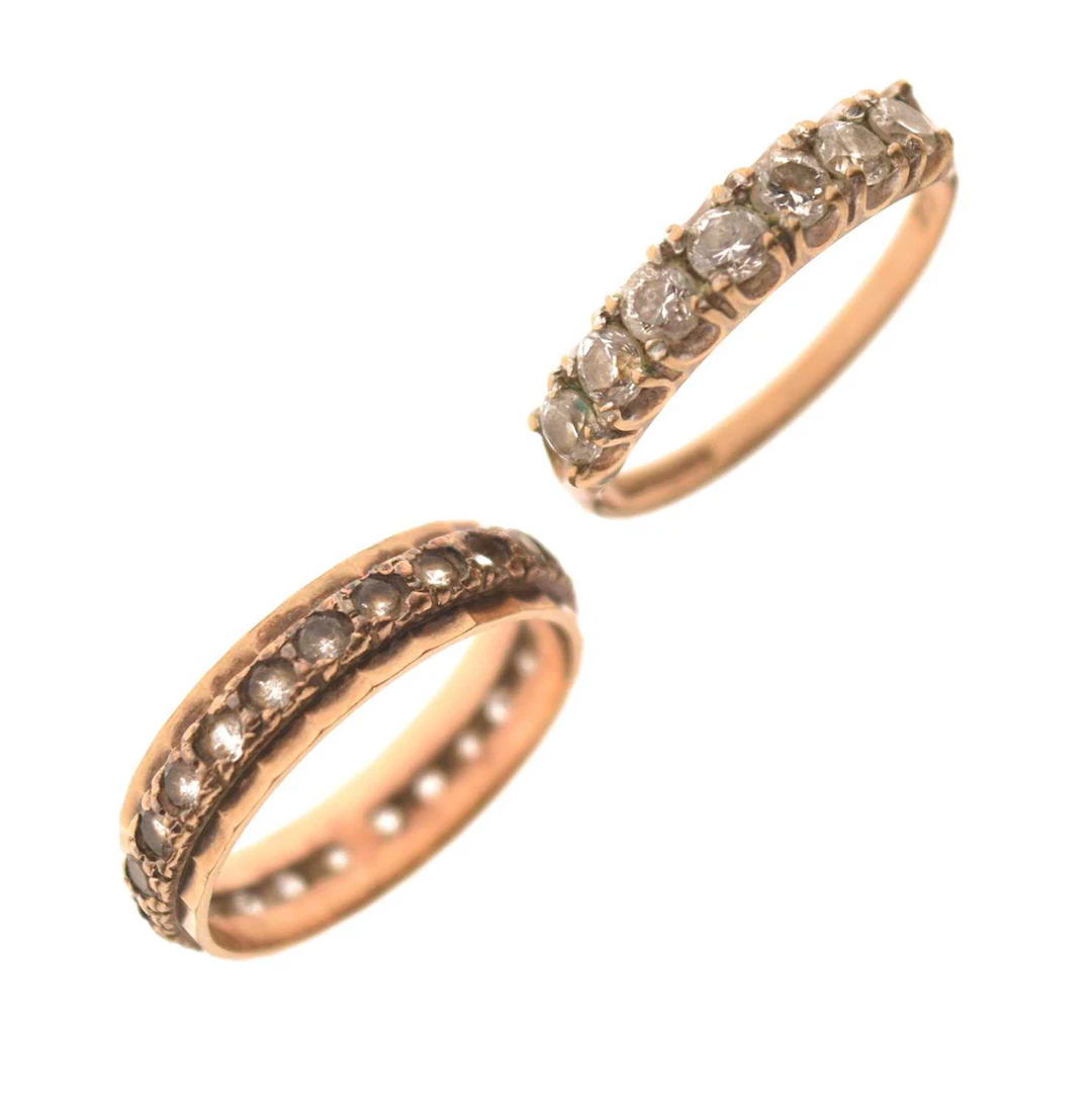 9ct gold eternity ring, and a cubic zirconia half hoop 9ct gold ring